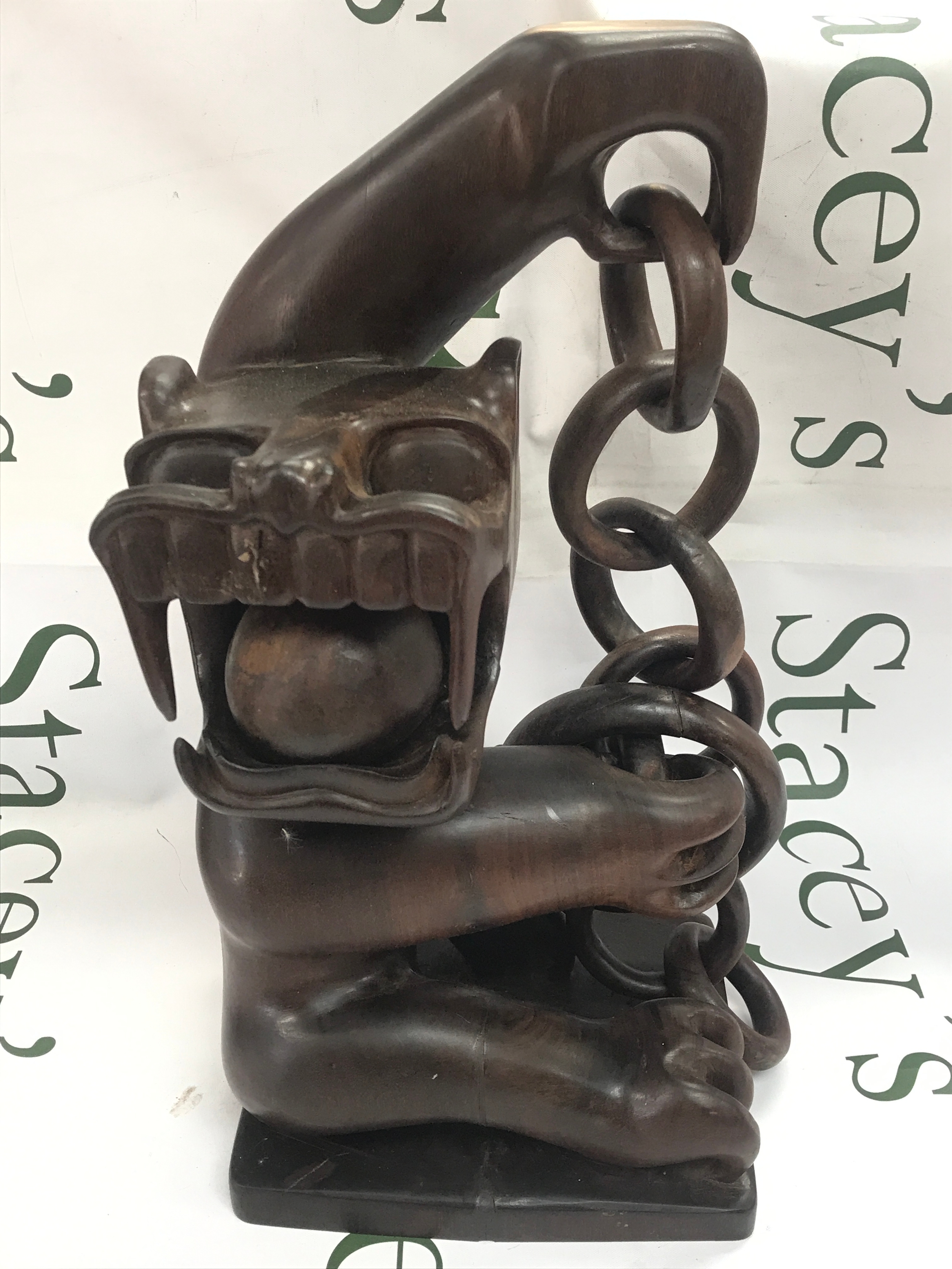 Moyang Harimau Berantai (Tiger in Chains) wooden spirit sculpture carved by the Mah Meri indigenous people of Carey Island, Malaysia. 39cm tall