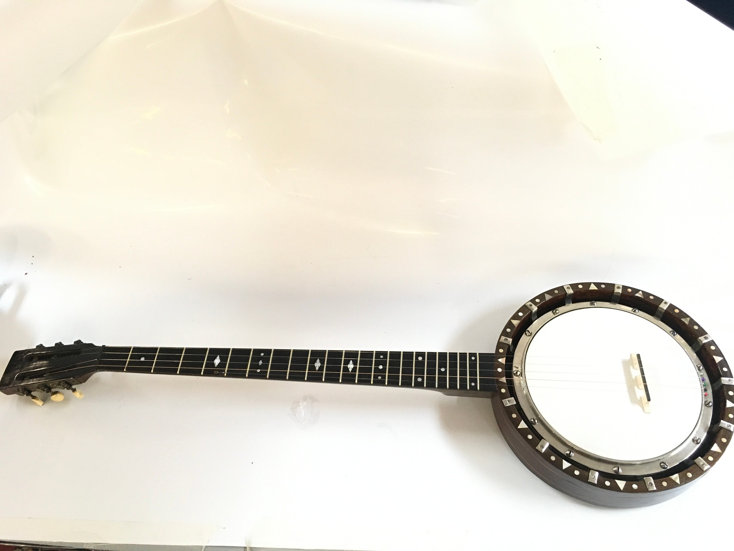 Cased Banjo. Approximately 90cm long  NO RESERVE