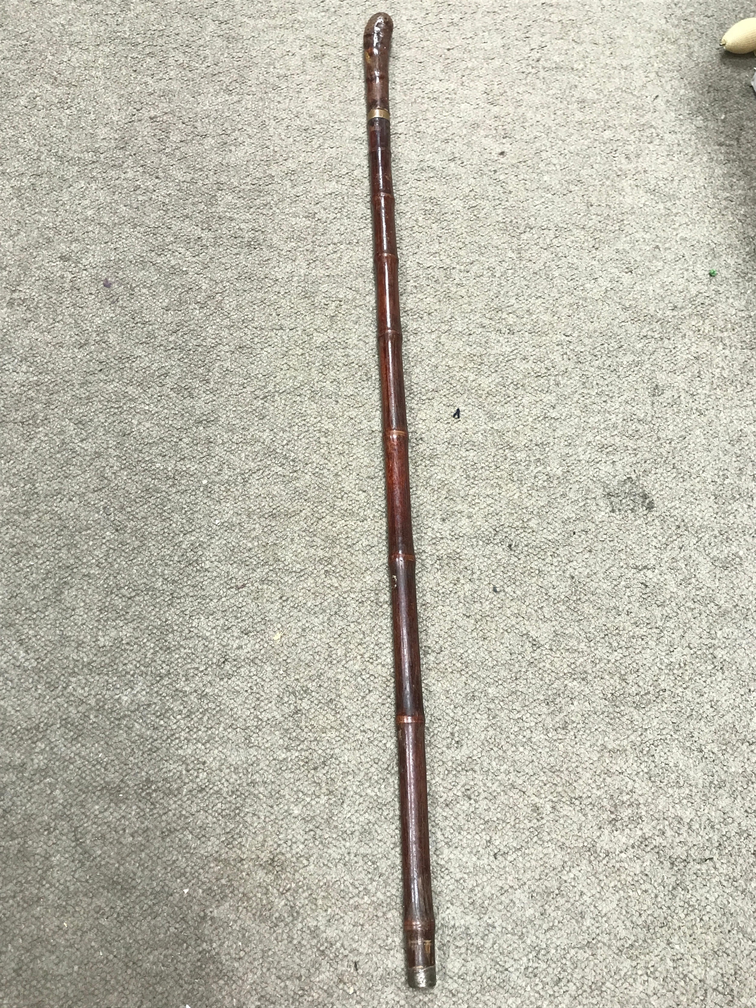 A natural bamboo sword stick, blade marked Solingen 35cm long, 88cm long total length 