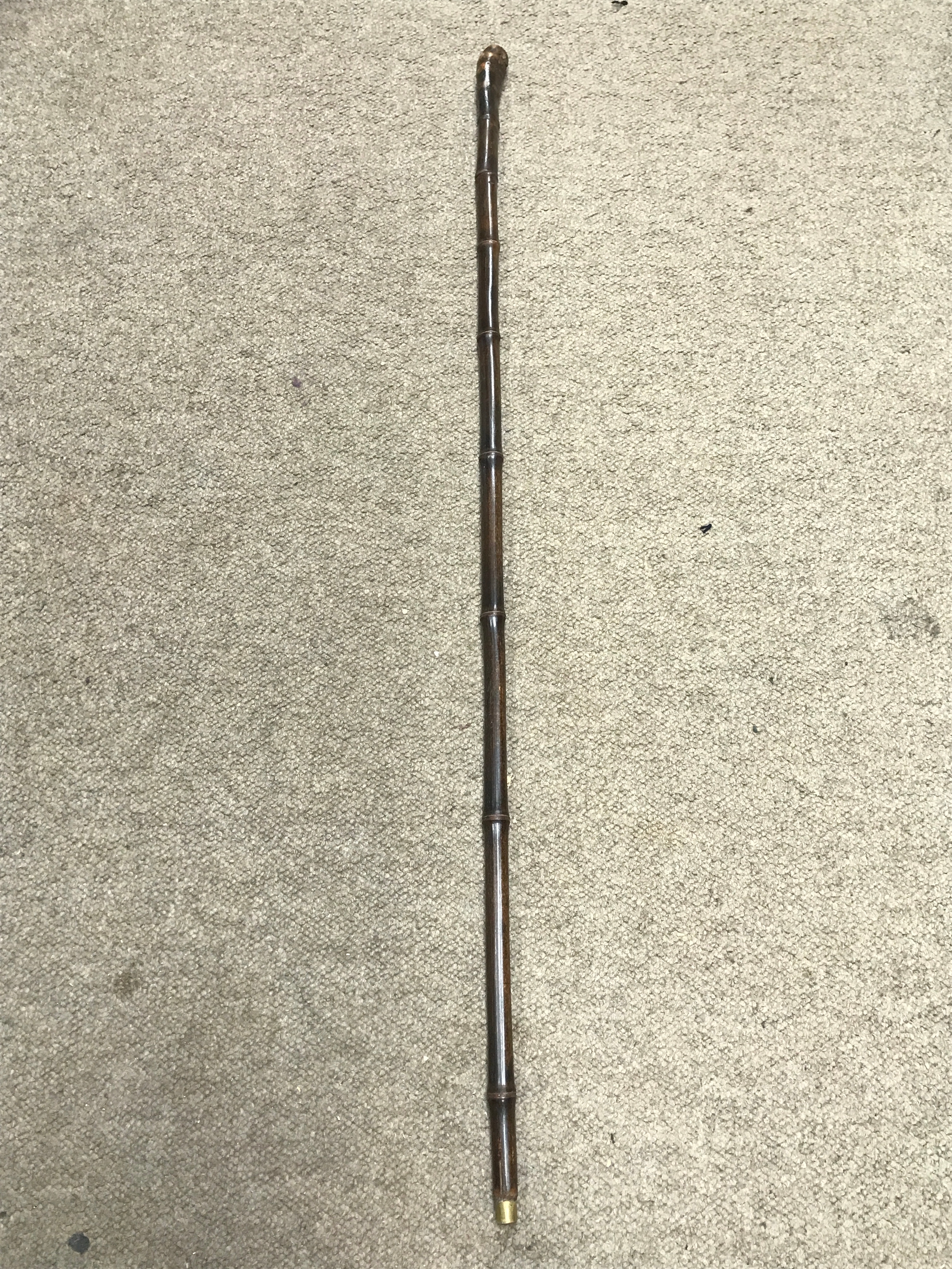 A natural bamboo sword stick. Blade 58cm long, total length 92cm