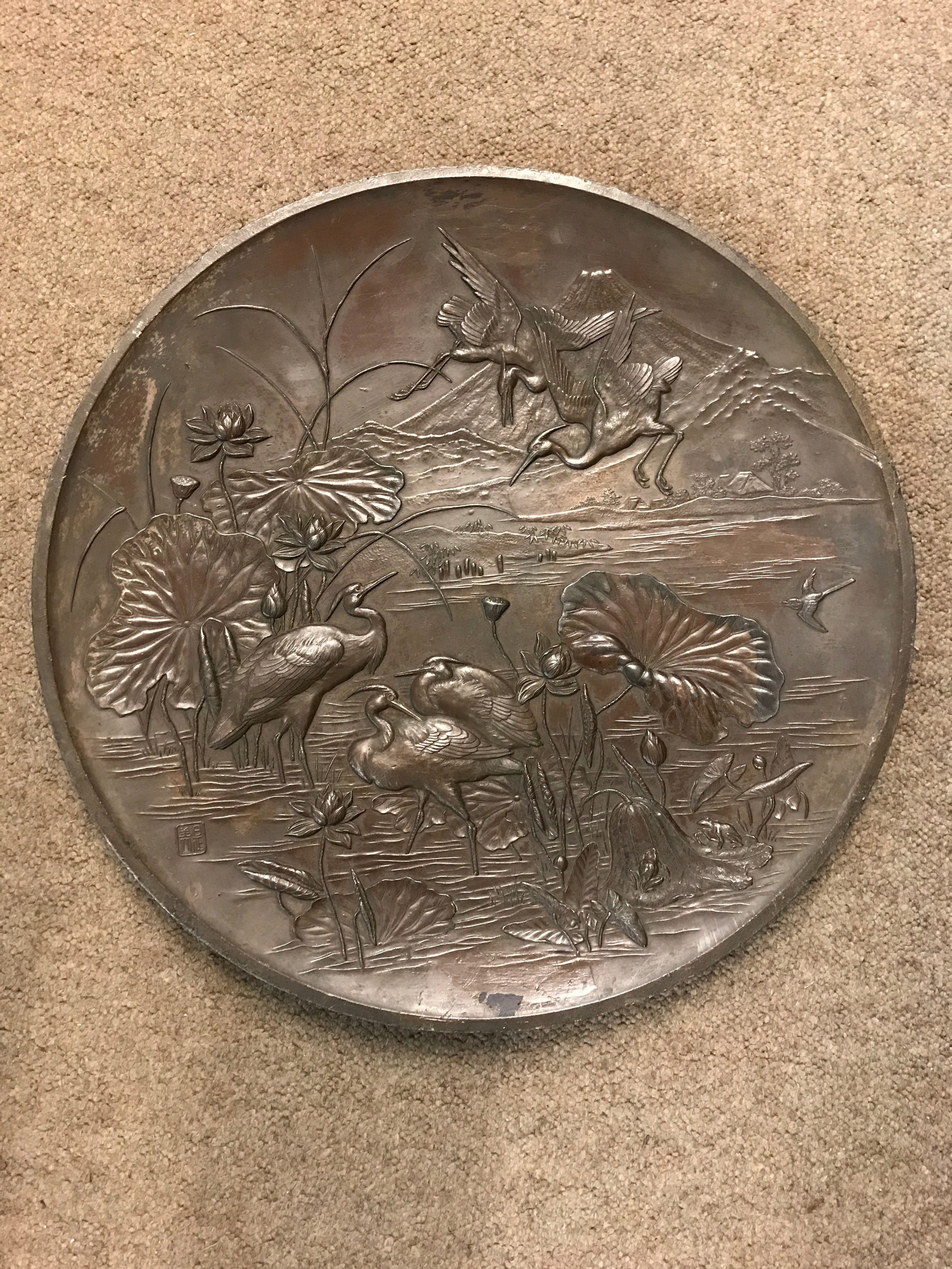 A late 19th century Japanese bronze plaque.