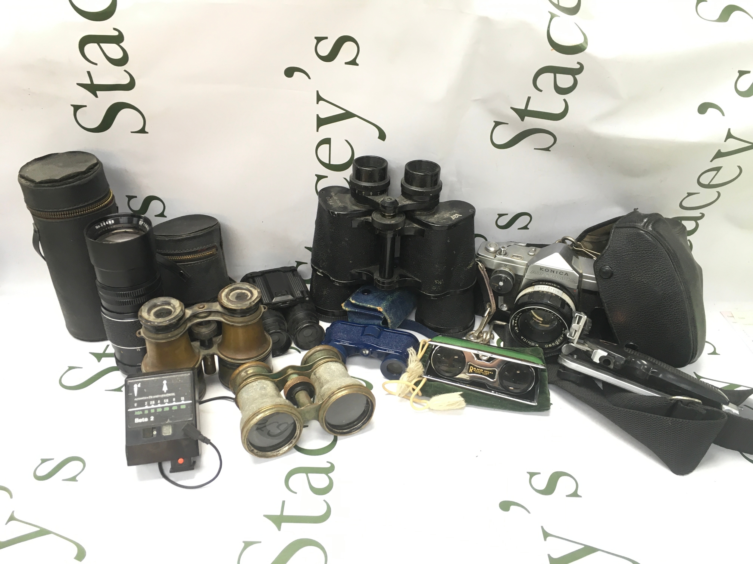 A box containing binoculars and camera equipment 