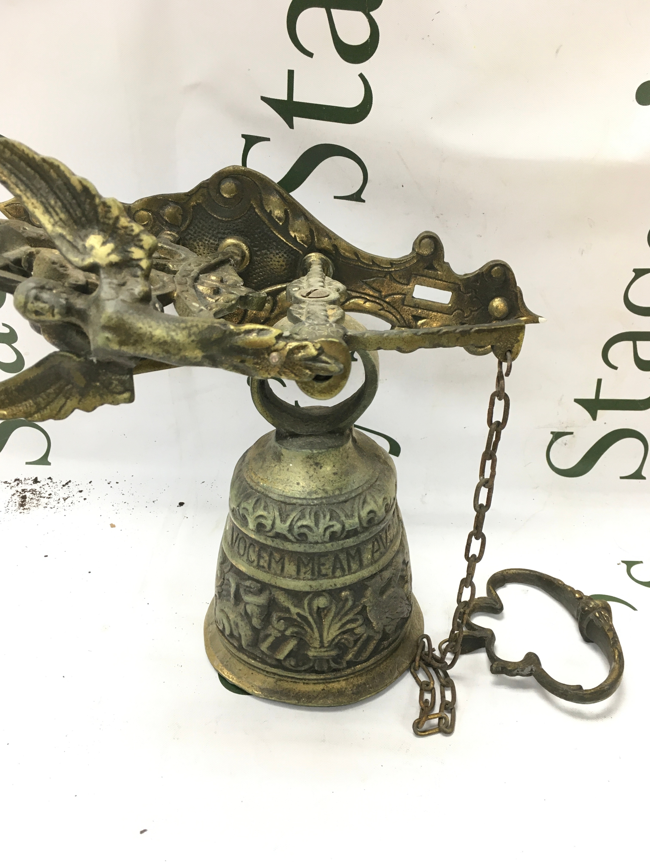 A brass door bell 