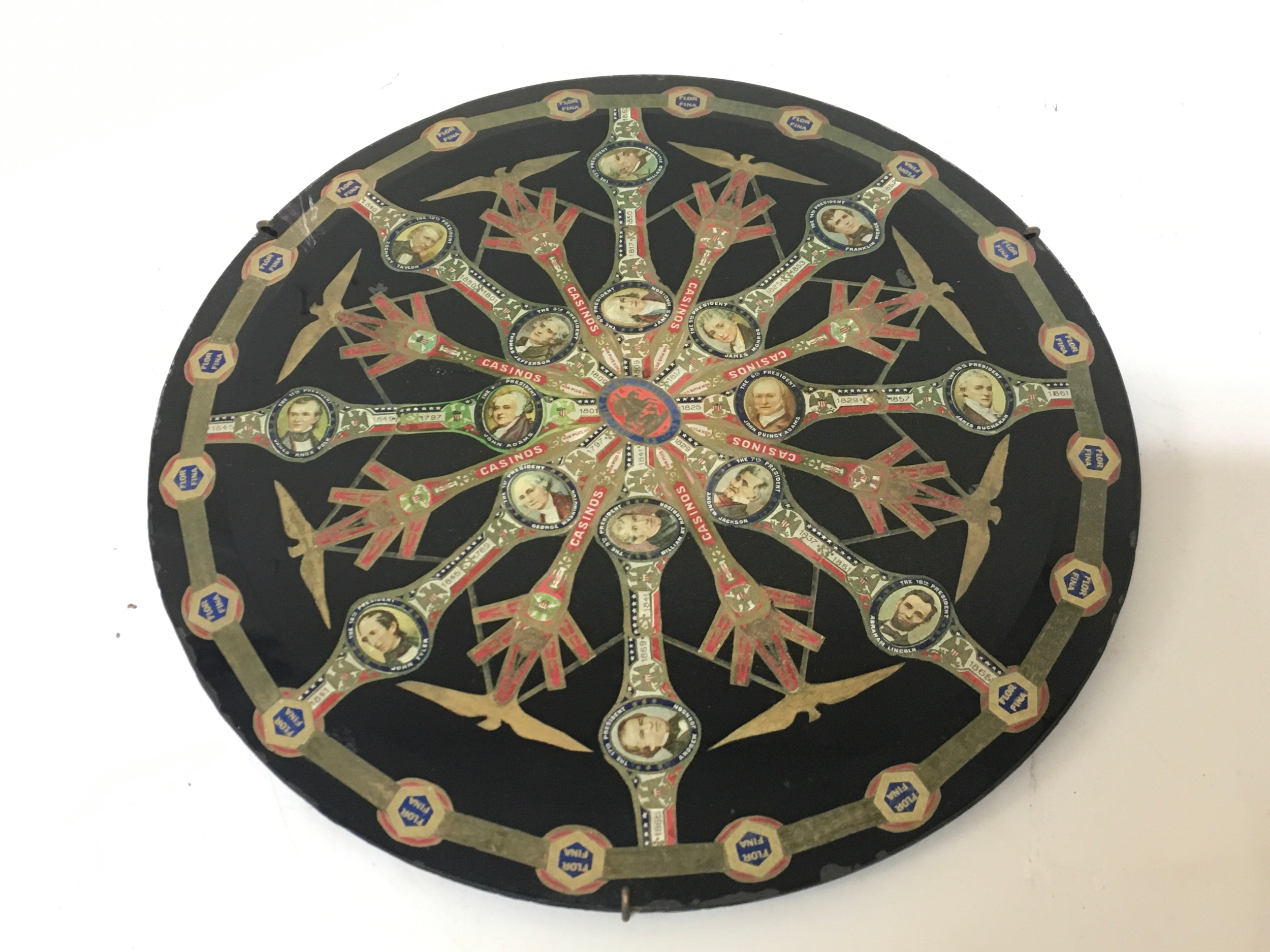 An interesting decorative piece featuring a collage of US presidential portraits and cigar bands (labeled "Casinos").30cm wide