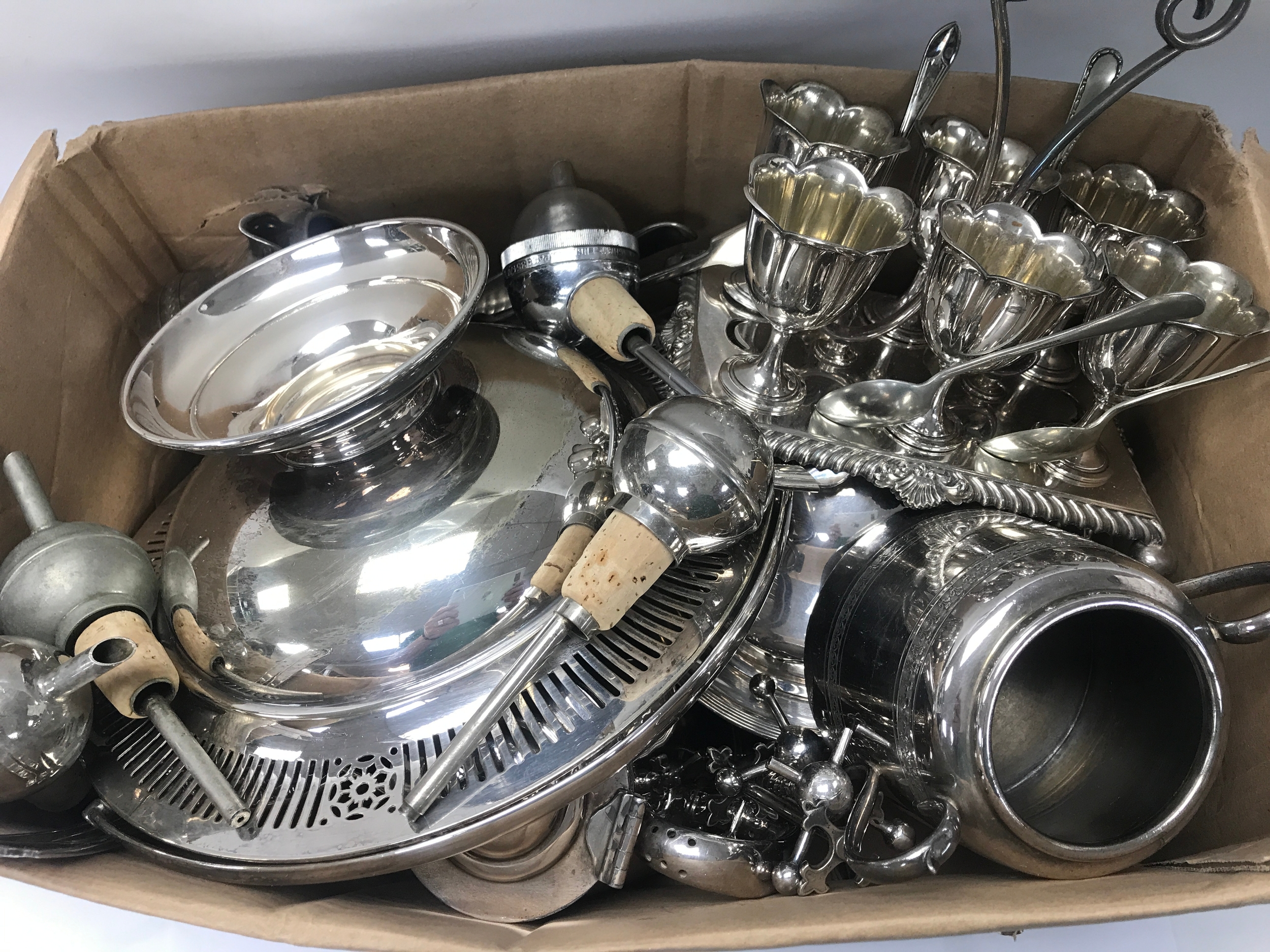 A collection of various silver plated items.