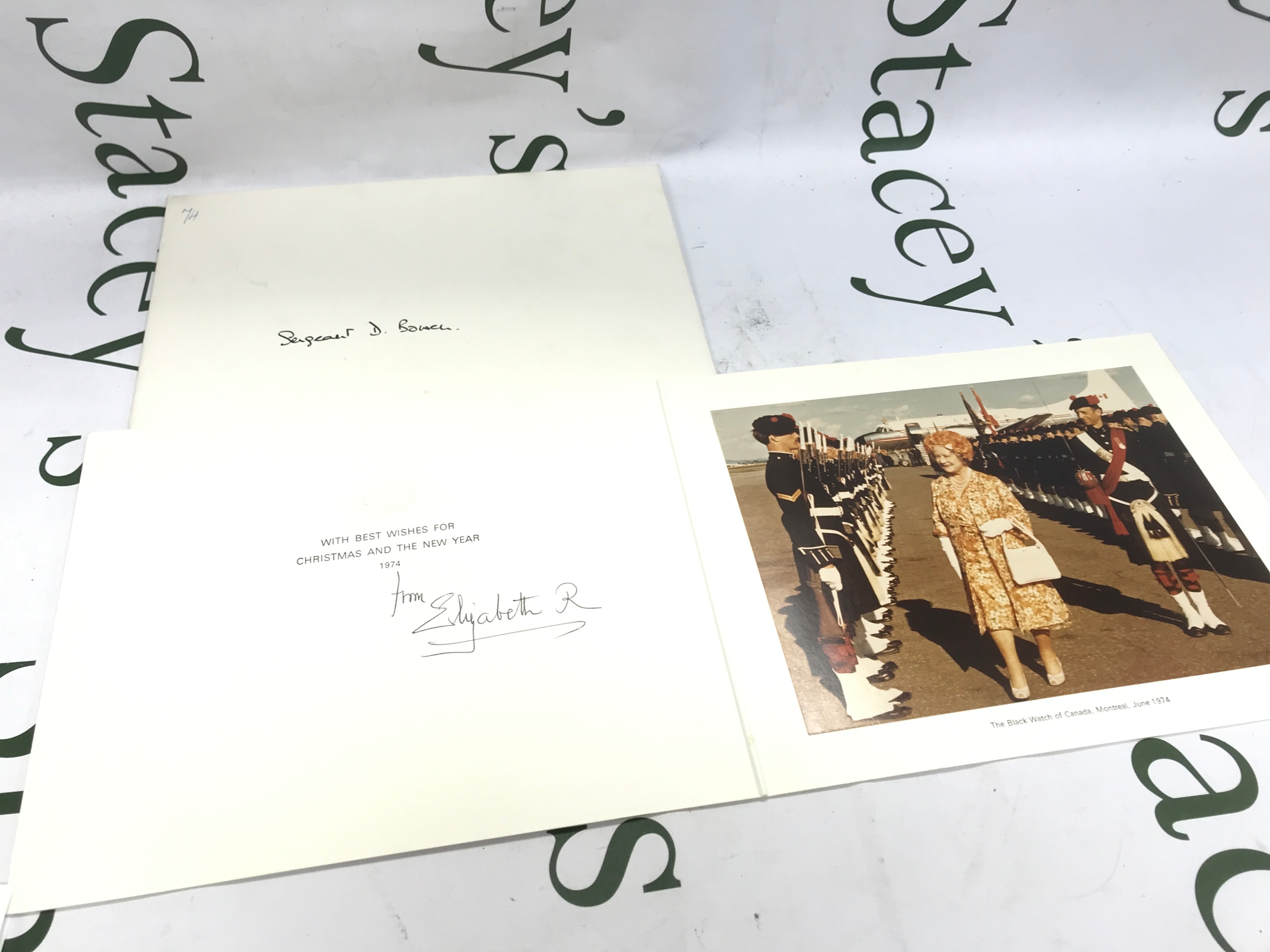 H.M. Queen Elizabeth The Queen Mother 1900-2002, two signed Christmas cards 1974 with a gilt embossed crown to cover. The 1974 card with colour photograph of The Queen Mother and The Black Watch of Canada, Montreal, June 1974, signed 'from Elizabeth R'.