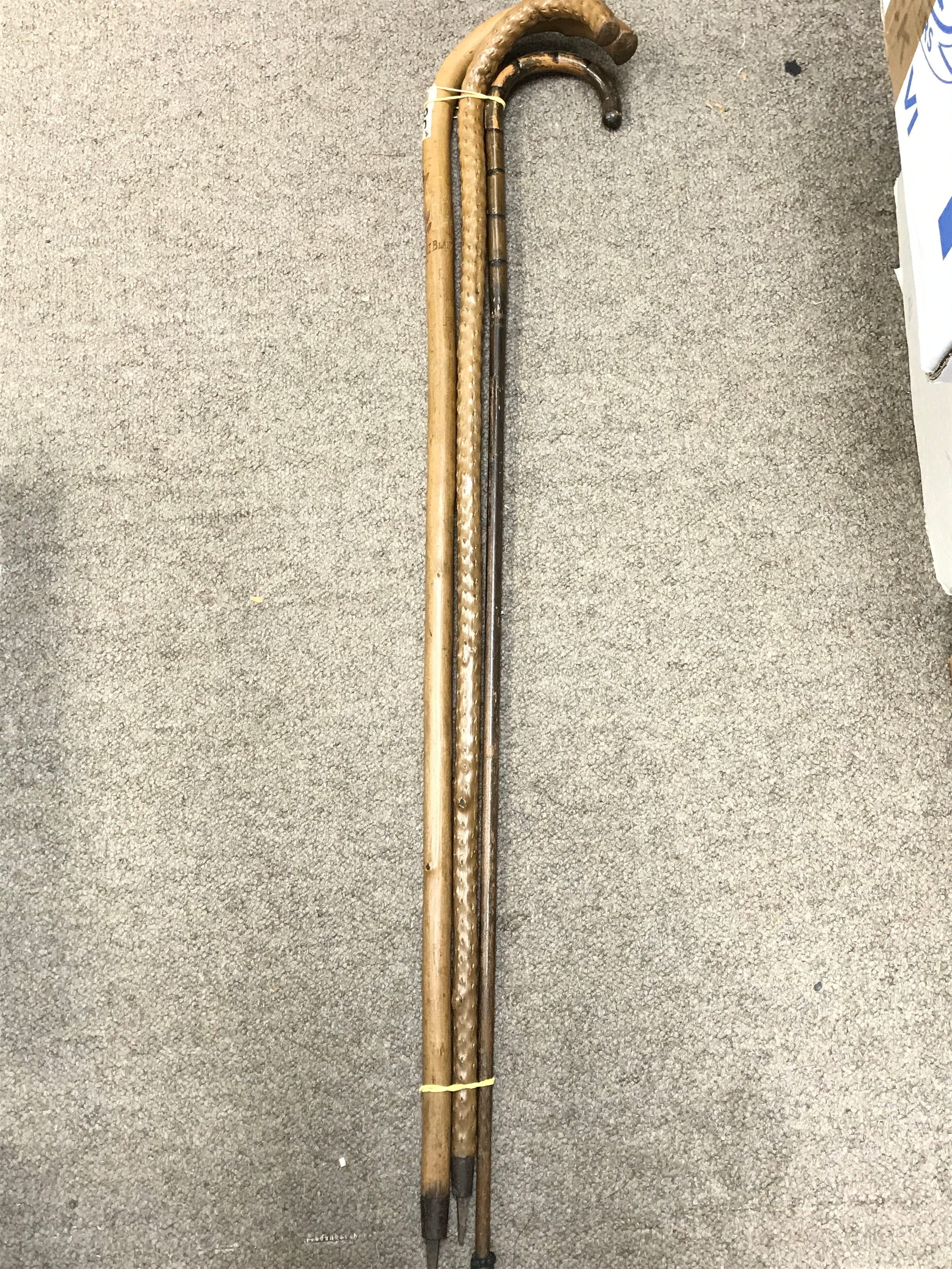 Three walking sticks 94cm long 
