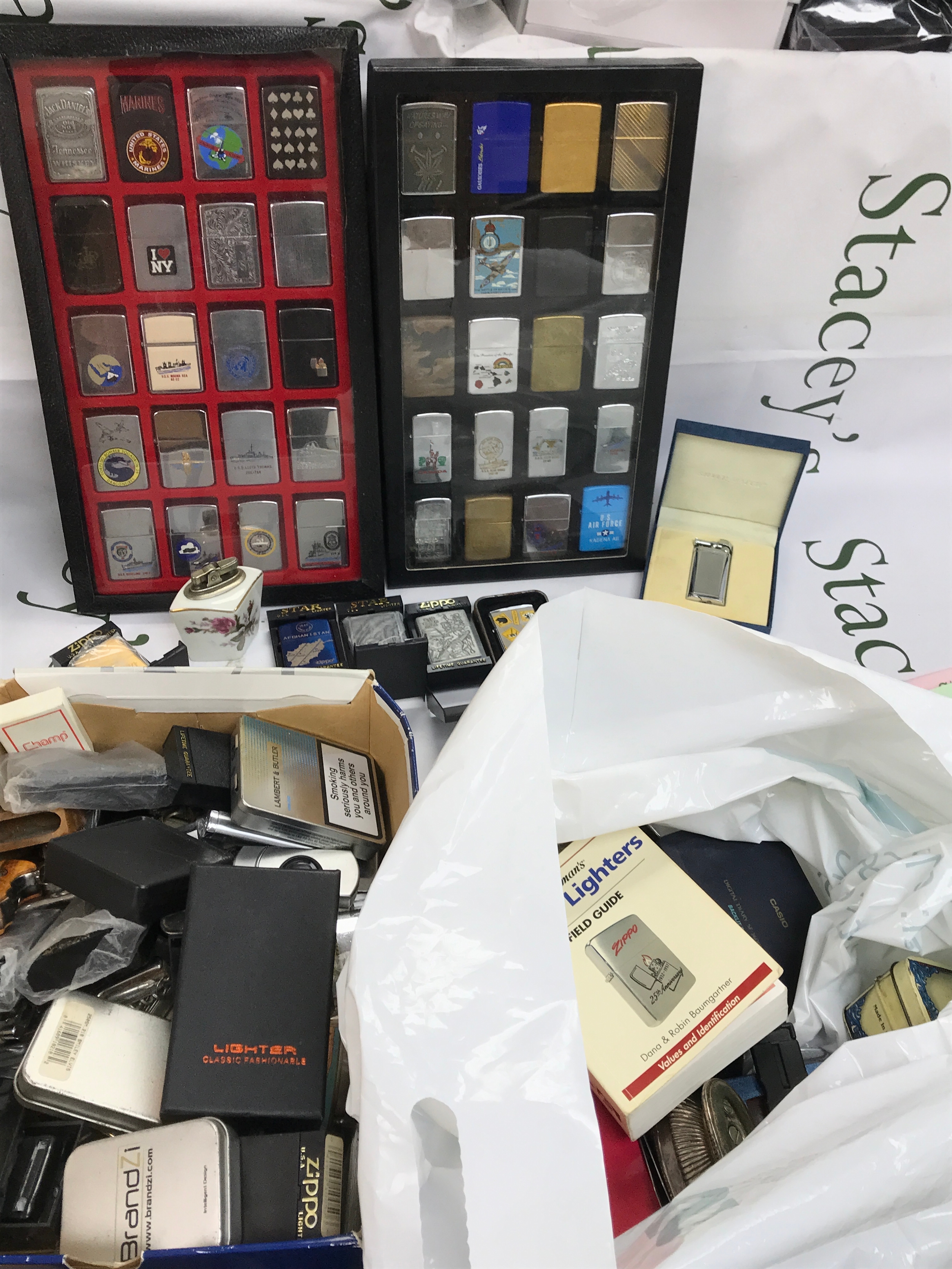 A large collection of vintage lighters including Zippo, Star etc 