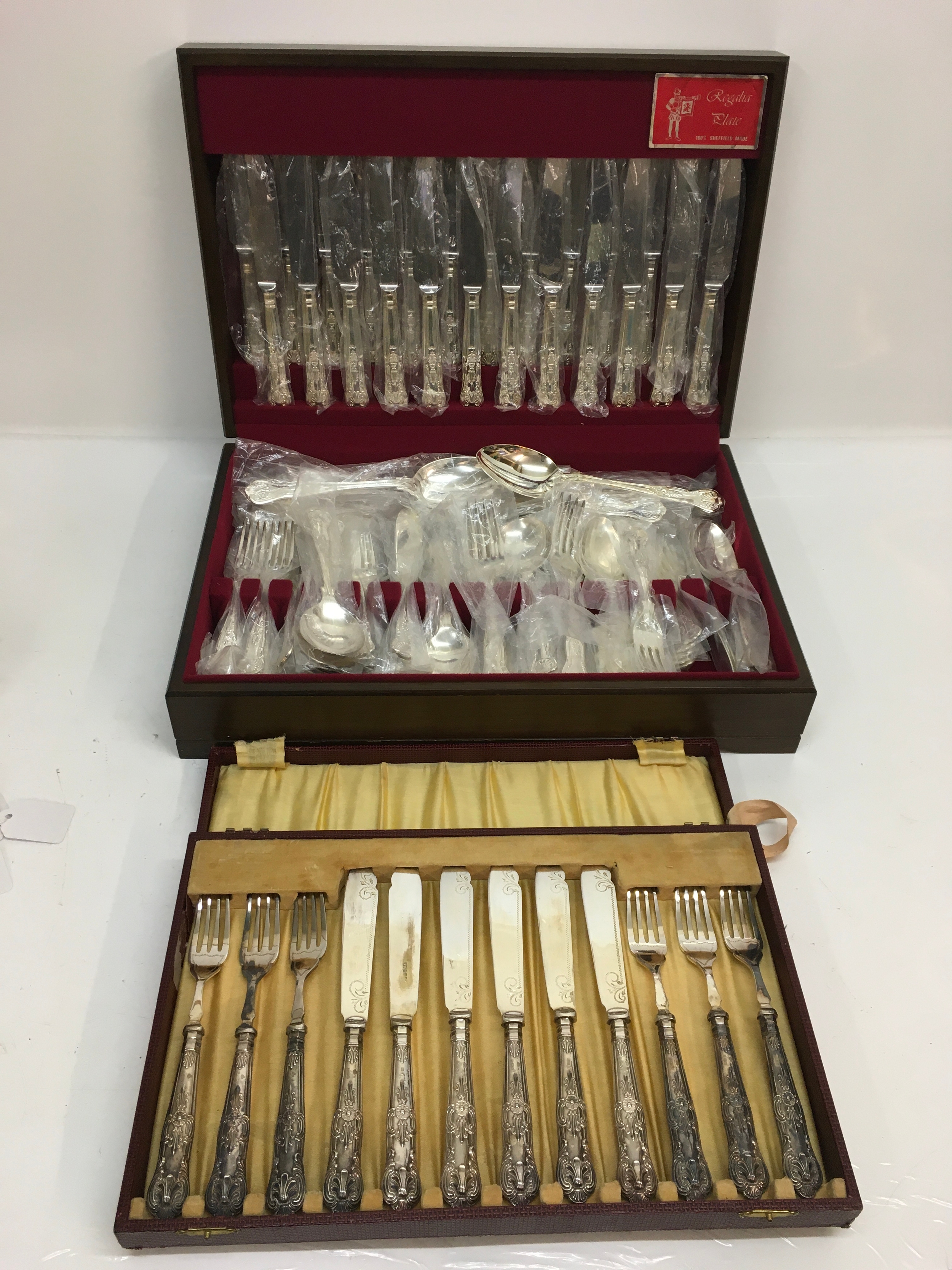 A Regalia Plate canteen of cutlery, plus one other smaller set