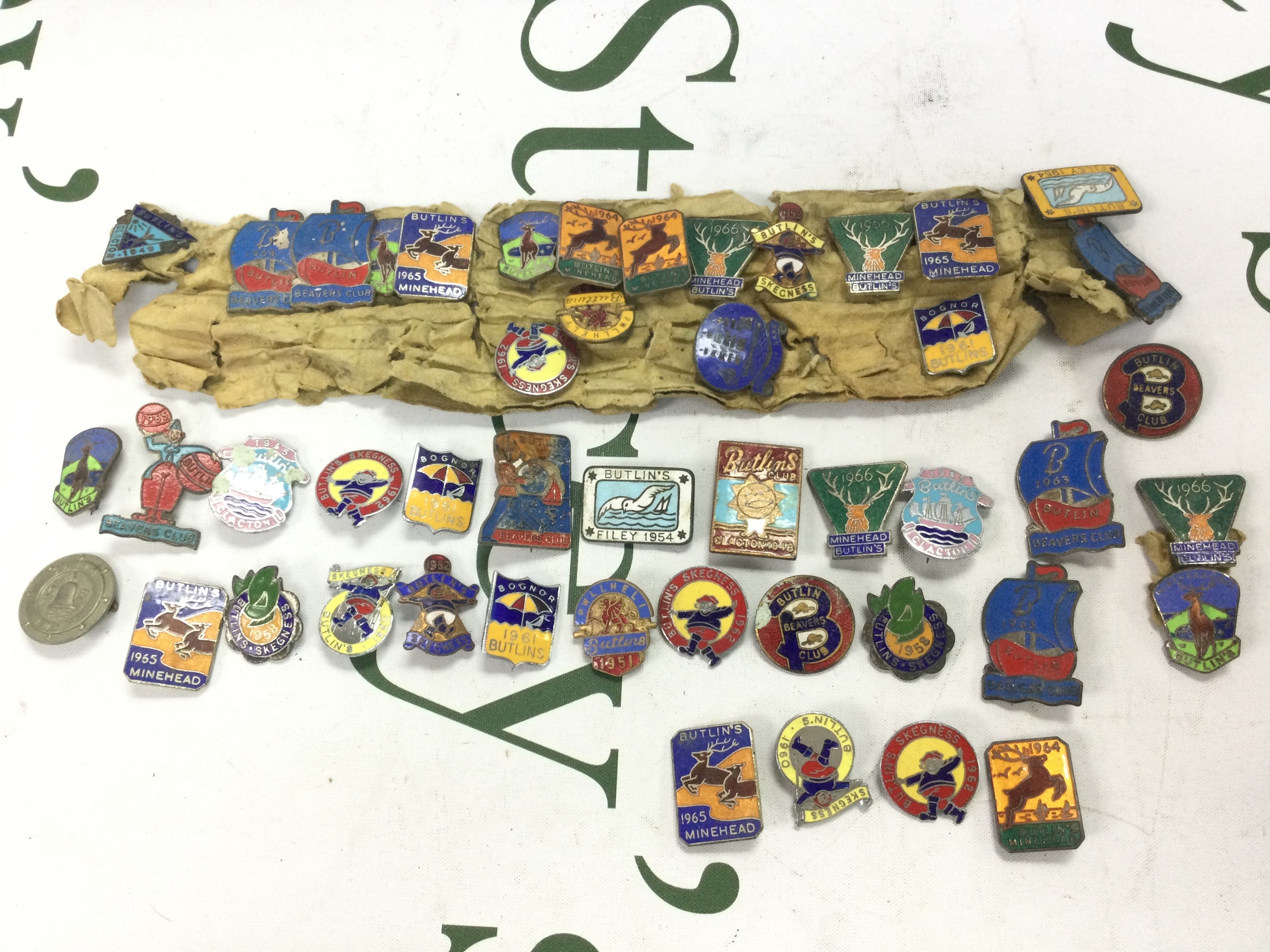 A collection of vintage Butlins badges 50s-60s