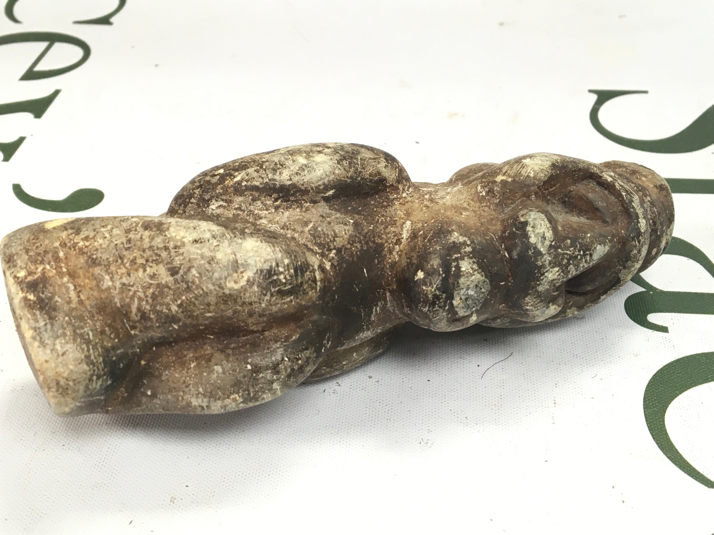 Antique stone carving of a fetish figure, 13cm