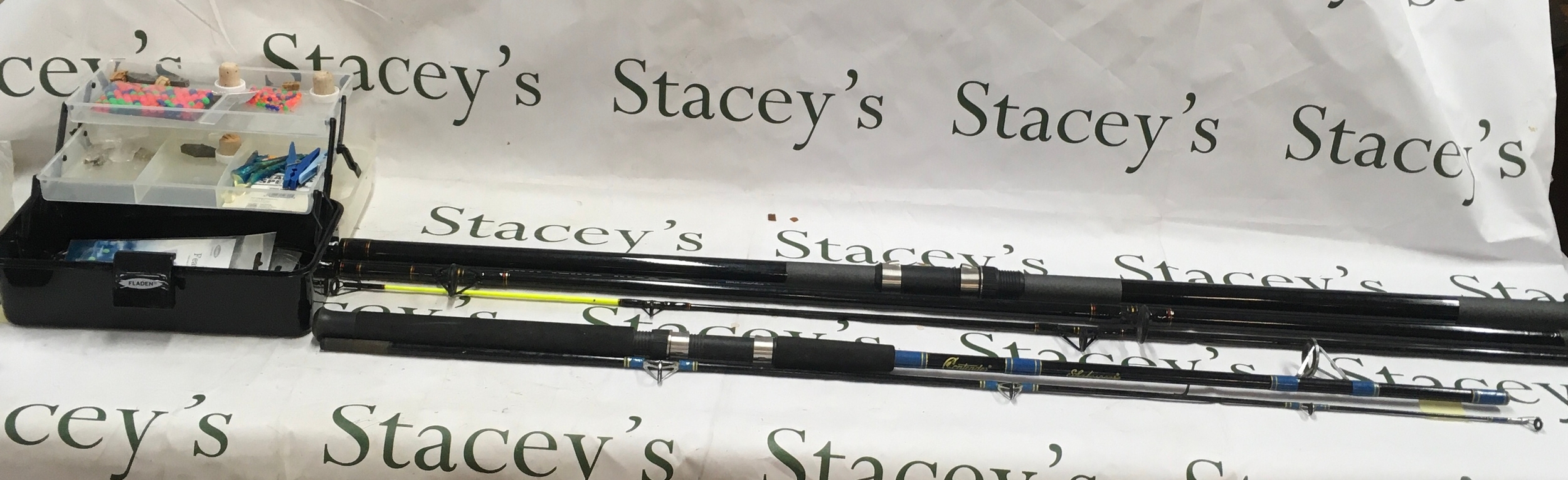 A collection of various fishing rods and accessories