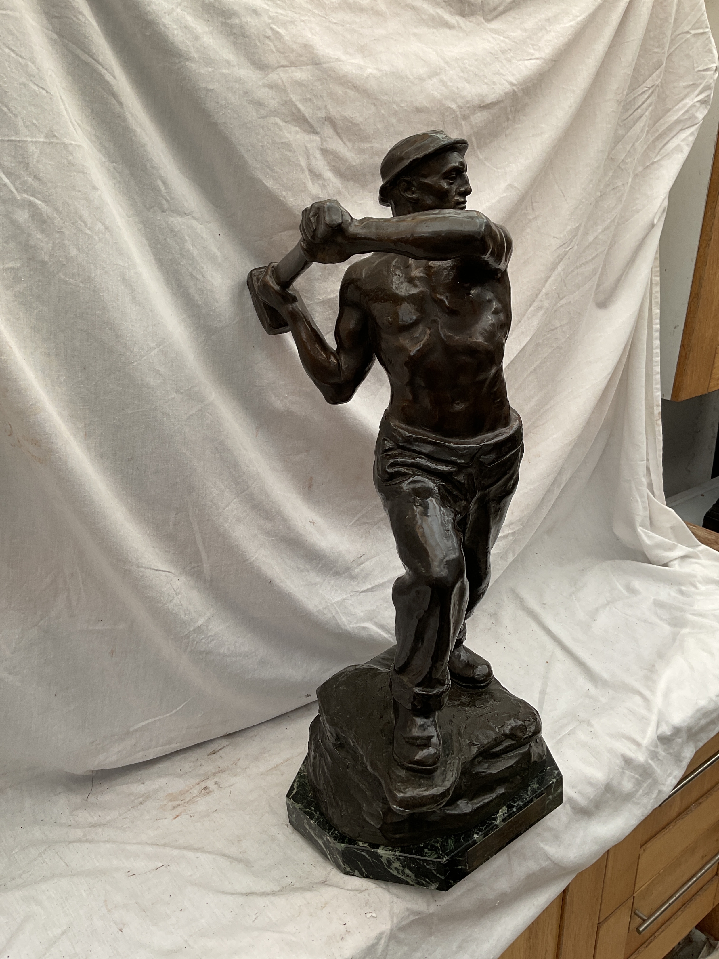 "Der Schmied" by Paul Vogelsanger (German 1880-1967) 1925, large Bronze on marble base with presentation plaque in German for 25 years Technische Abtelung to a Senior Engineer Schuler. H70cm.  Maximilian Joseph Johannes Eduard Schuler (5 February 1882 in Zweibrücken– 30 July 1972)[1] was a German engineer and is best known for discovering the principle known as Schuler tuning which is fundamental to the operation of a gyrocompass or inertial guidance system that will be operated near the surface of the Earth.[2]  Schuler's cousin Hermann Anschütz-Kaempfe founded a firm near Kiel, Germany, to manufacture navigational devices using gyroscopes in 1905, and Schuler joined the firm in 1906. For many years they struggled with the problem of maintaining a vertical reference as a craft moved around on the surface of the Earth.  In 1923 Schuler published his discovery that if the gyrocompass was tuned to have an 84.4 minute period of oscillation (the Schuler period) then it would resist errors due to sideways acceleration of the ship or aircraft in which it was installed.  Later, Schuler served as a professor of dynamics at the University of Göttingen. According to the Mathematics Genealogy Project[3] he supervised one dissertation there, that of Kurt Magnus (whose other supervisor was Ludwig Prandtl).