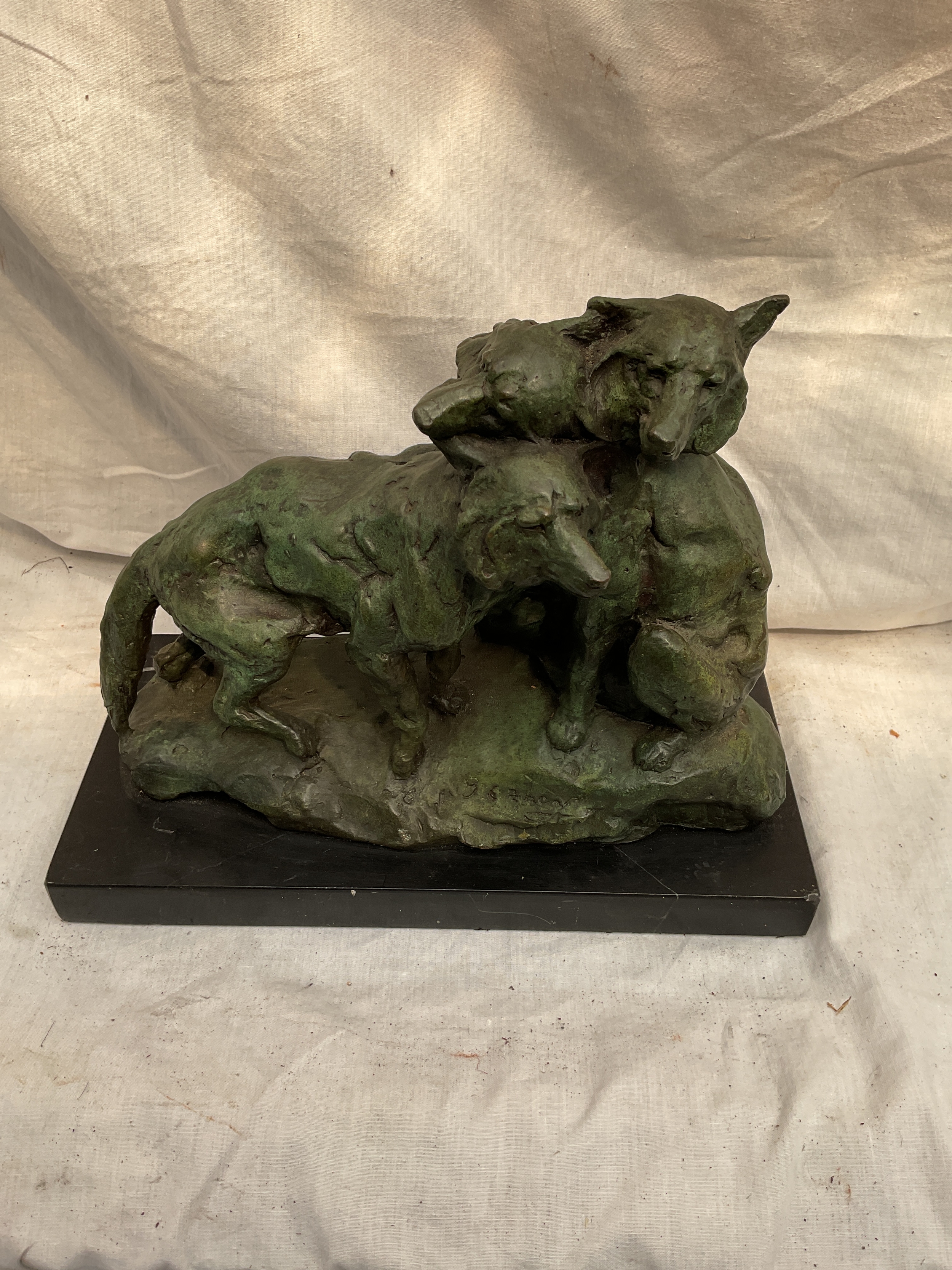 B C Zheng paginated Bronze of three Wolves, signed and on black marble base. H 24cm x W31cm.