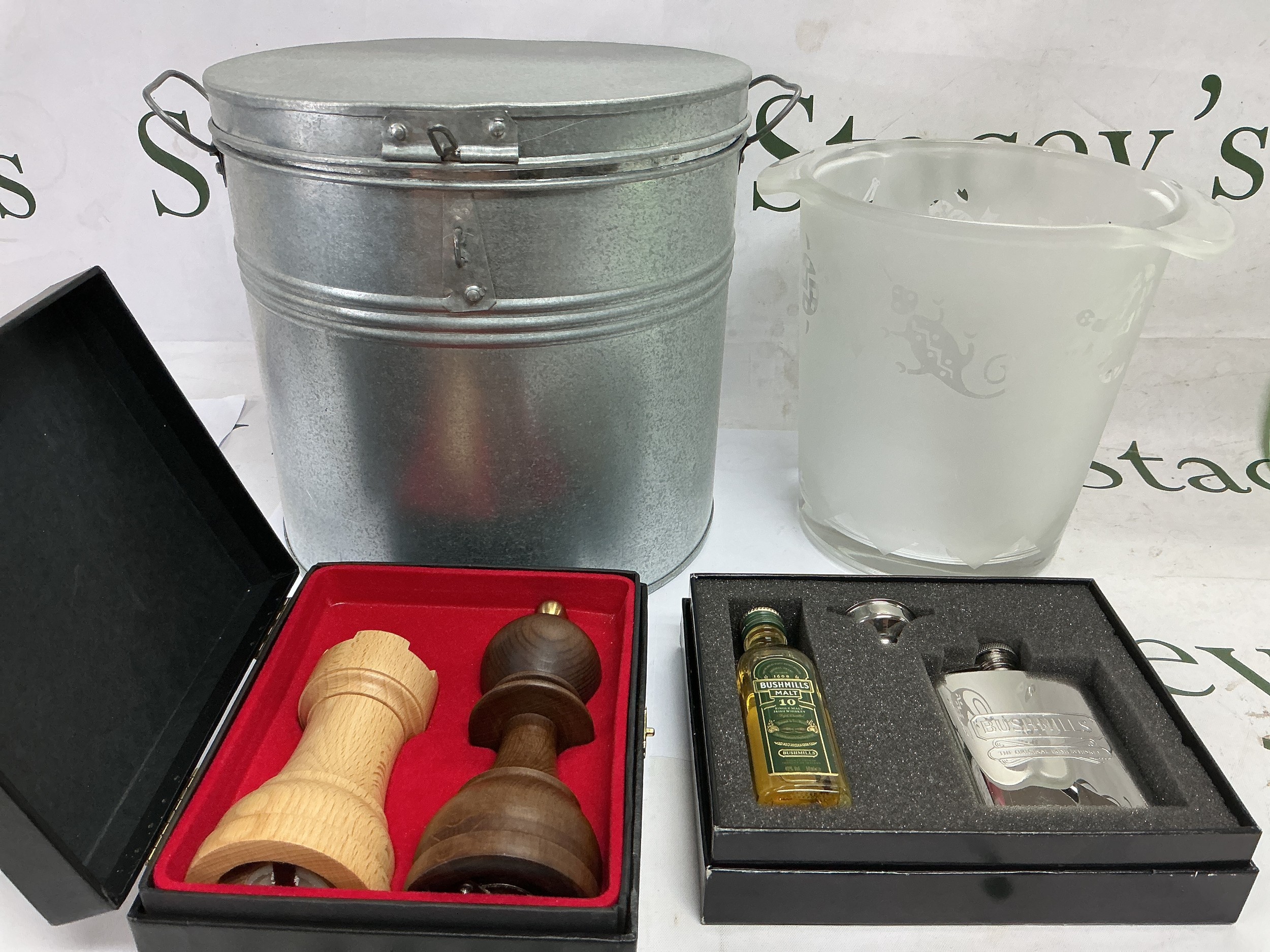 An ice bucket, boxed salt and pepper set modelled as chess pieces and a boxed hip flask and miniature Bushmills whiskey. NO RESERVE