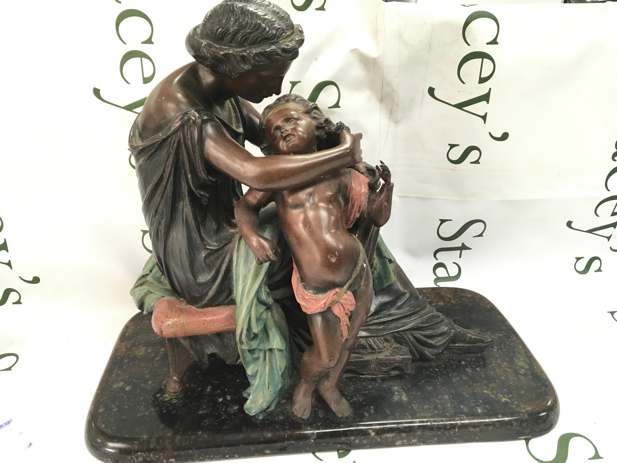 A vintage figure on a heavy marble base of a mother and child French 1912 signed and dated. Brass label reads A.G.J.F group ST.Pierre De Brain S/L Authion J Turquais 39cm tall 47cm wide No reserve 