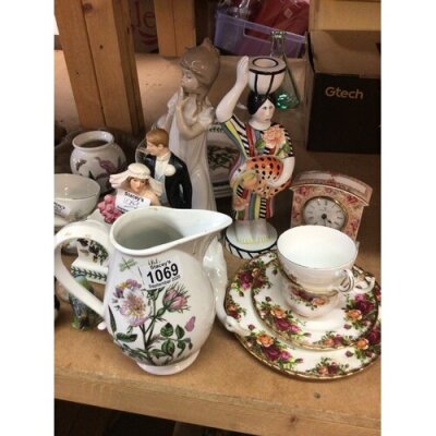 A collection of ceramics comprising PortMerion Villeroy Bosh figurines Royal Albert old English Country Rose and other ceramics.