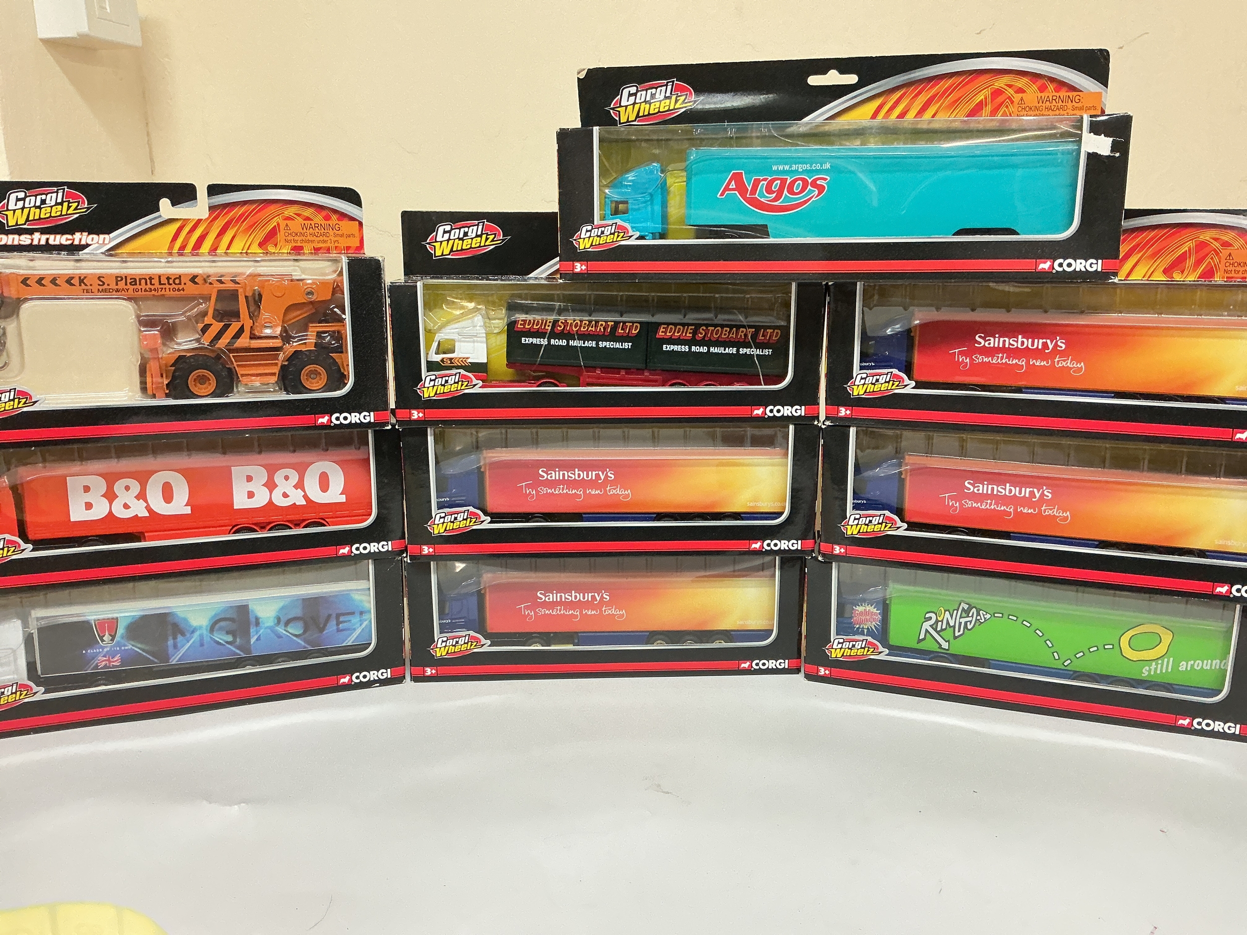 A Collection Of Corgi Wheelz Lorries.