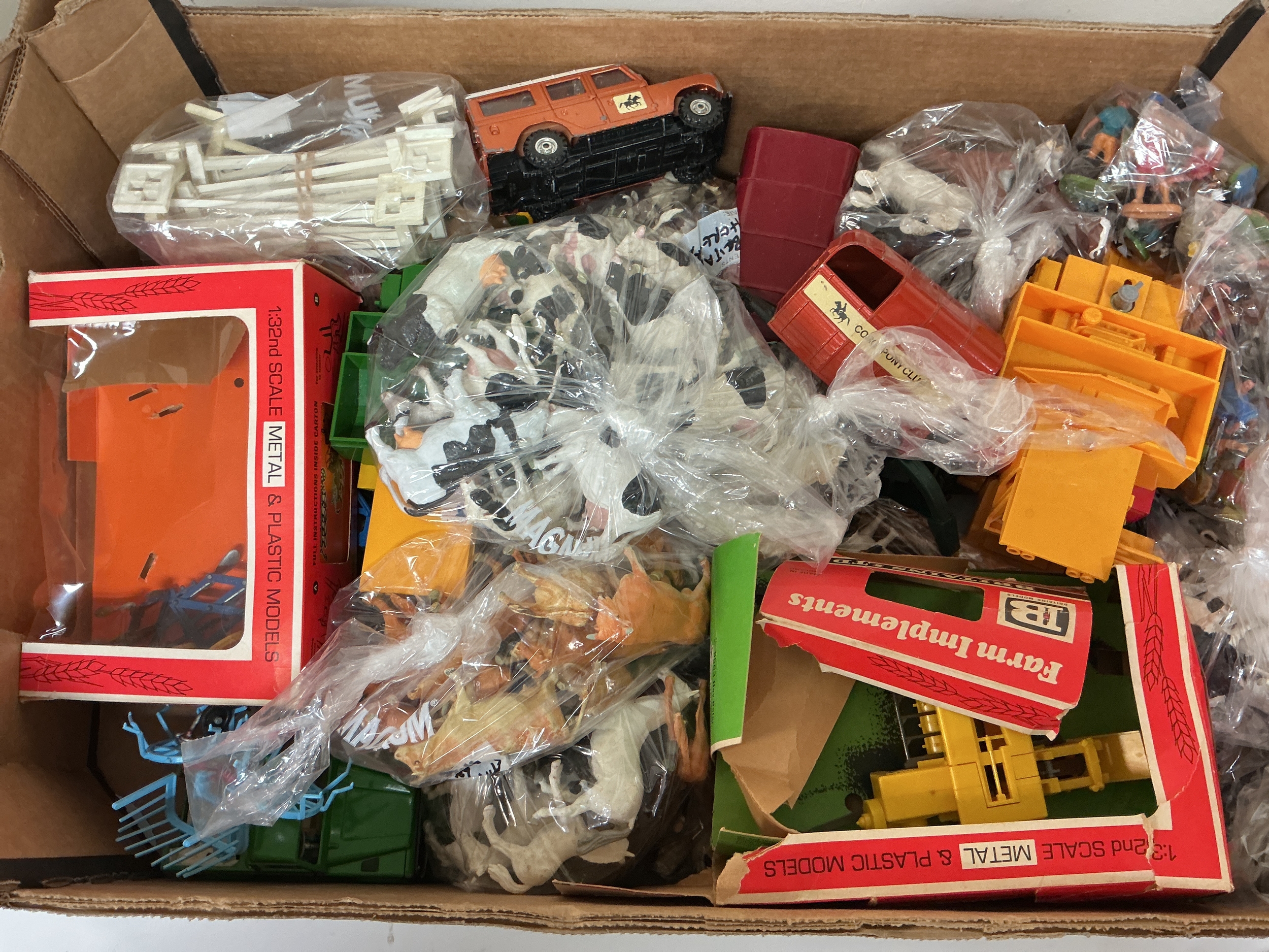 A Collection Of Britains Farming Machinery Plus in Excess Of 100 Figures.