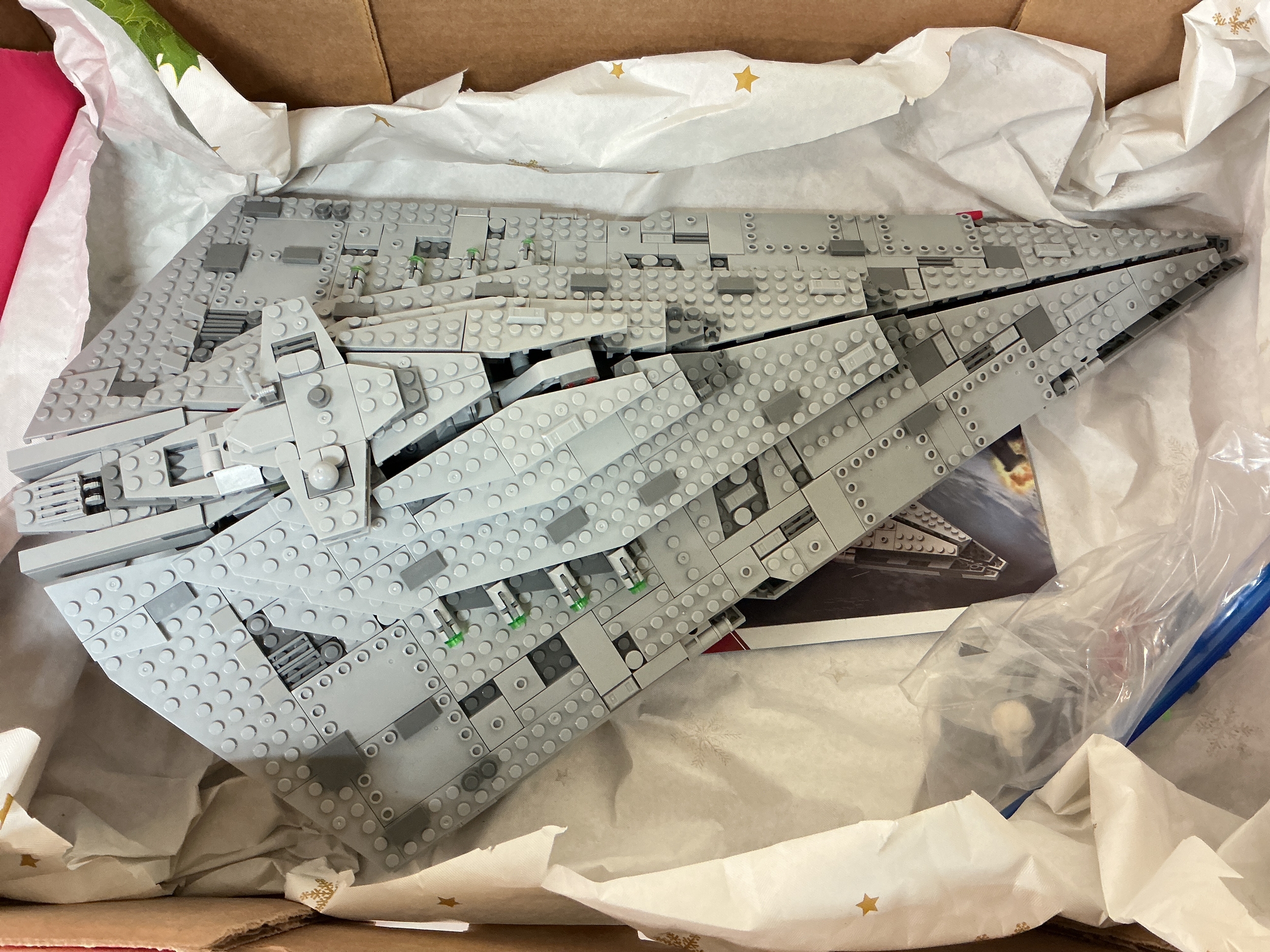 A Star Wars LEGO Style Star Ship With Figures And Instructions.