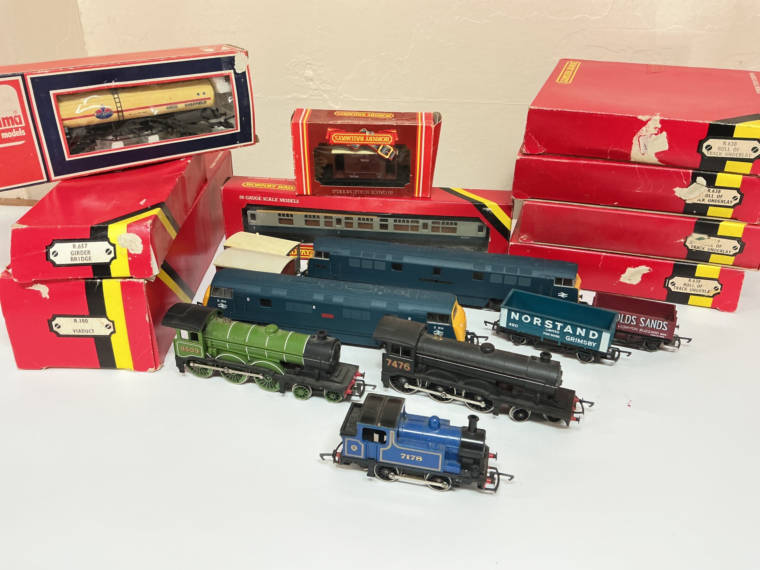 A Box Containing 00 Gauge Locomotives. Rolling Stock, Track And Accessories.