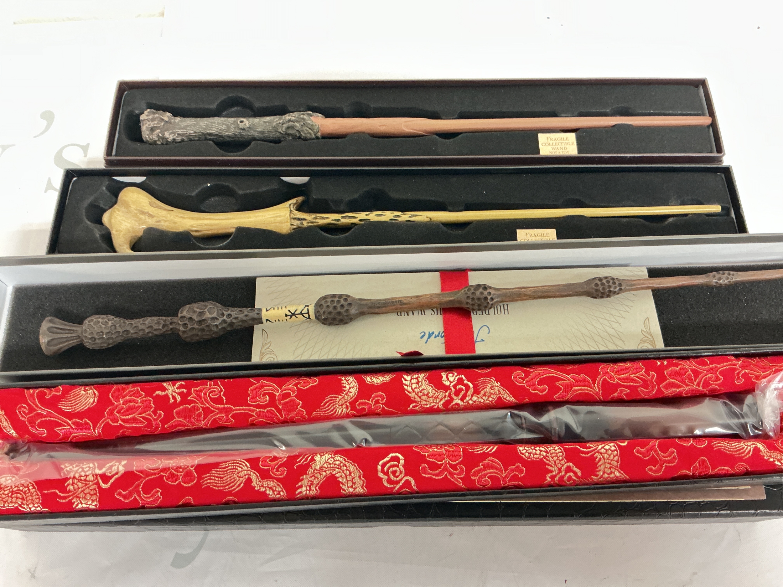 4 X Boxed Harry Potter Wands.