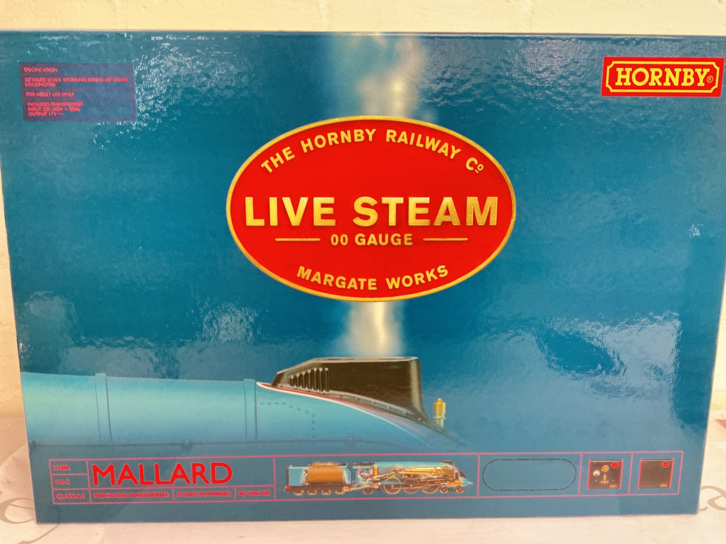 A Boxed Hornby Live Steam 00 Gauge Mallard. Appears to be new With Shipping Box.