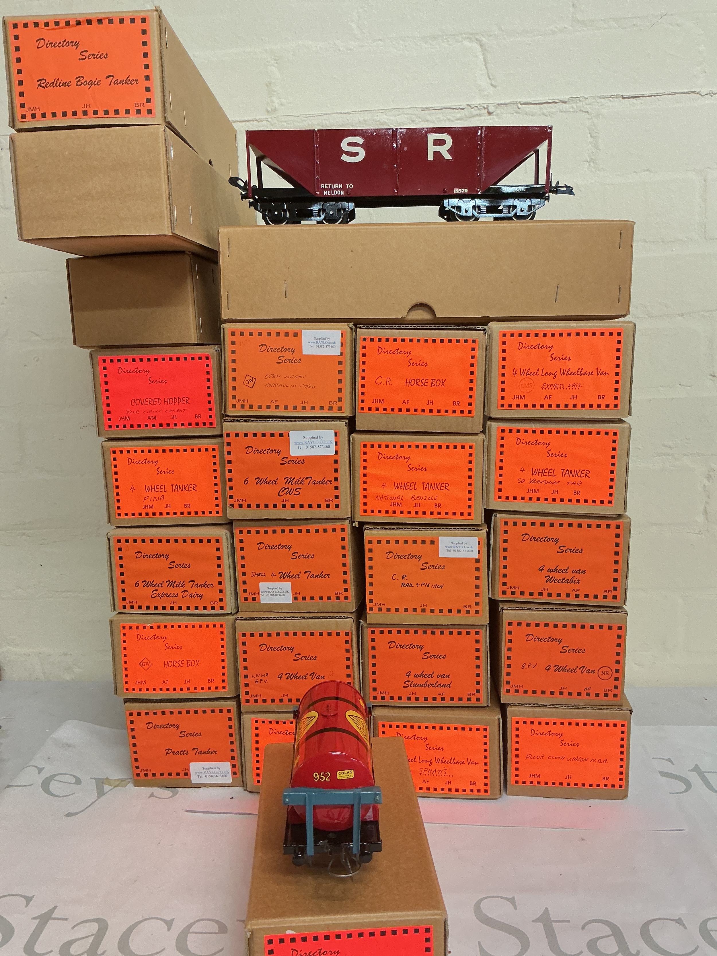 A Large Collection Of Directory Series 0 Gauge Wagons And Vans. No Reserve.