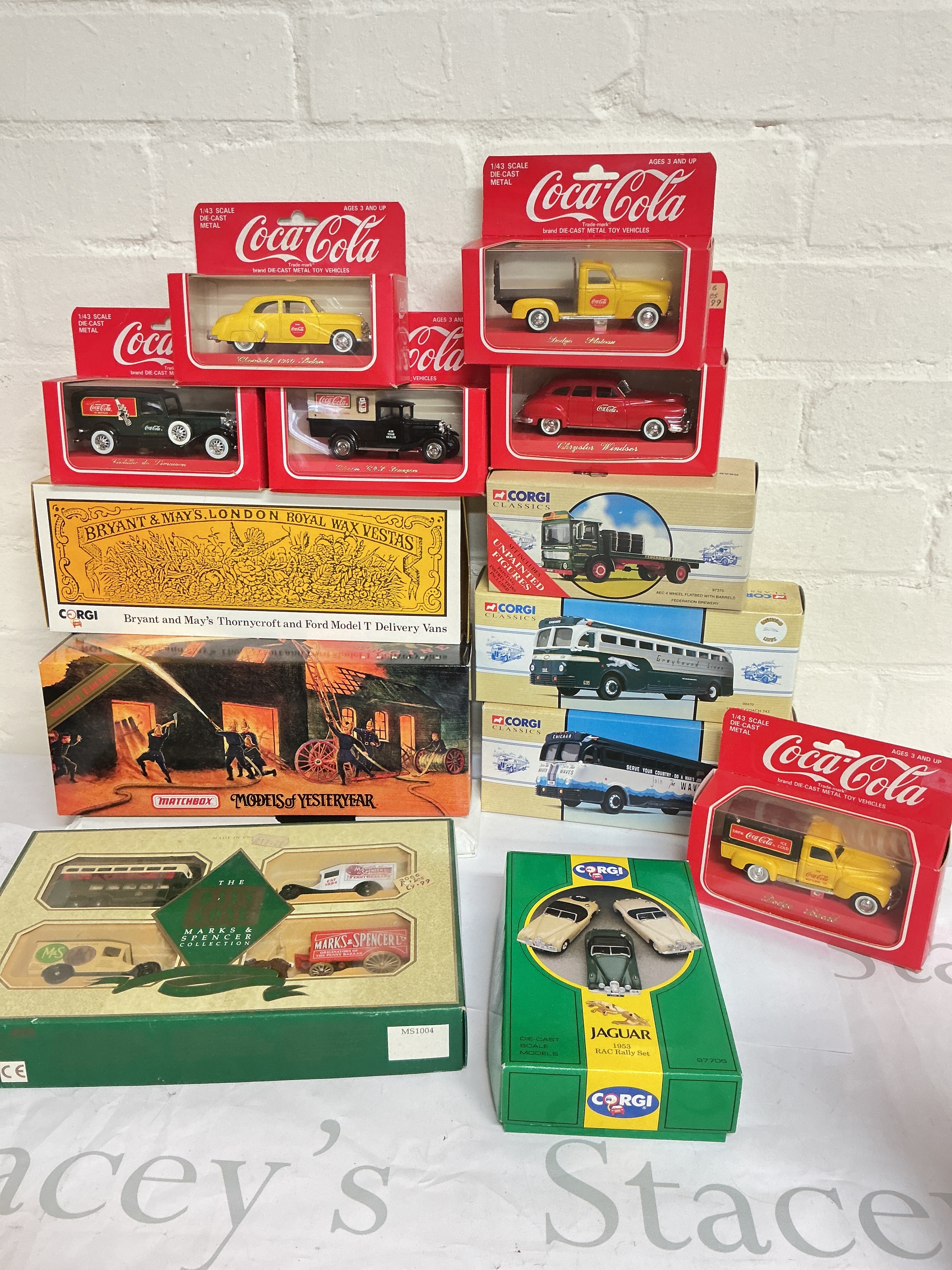 A Box Containing Various Boxed Diecast Including matchbox, Corgi, Coca Cola.etc. And A Collection Of Playworn Diecast. No Reserve.
