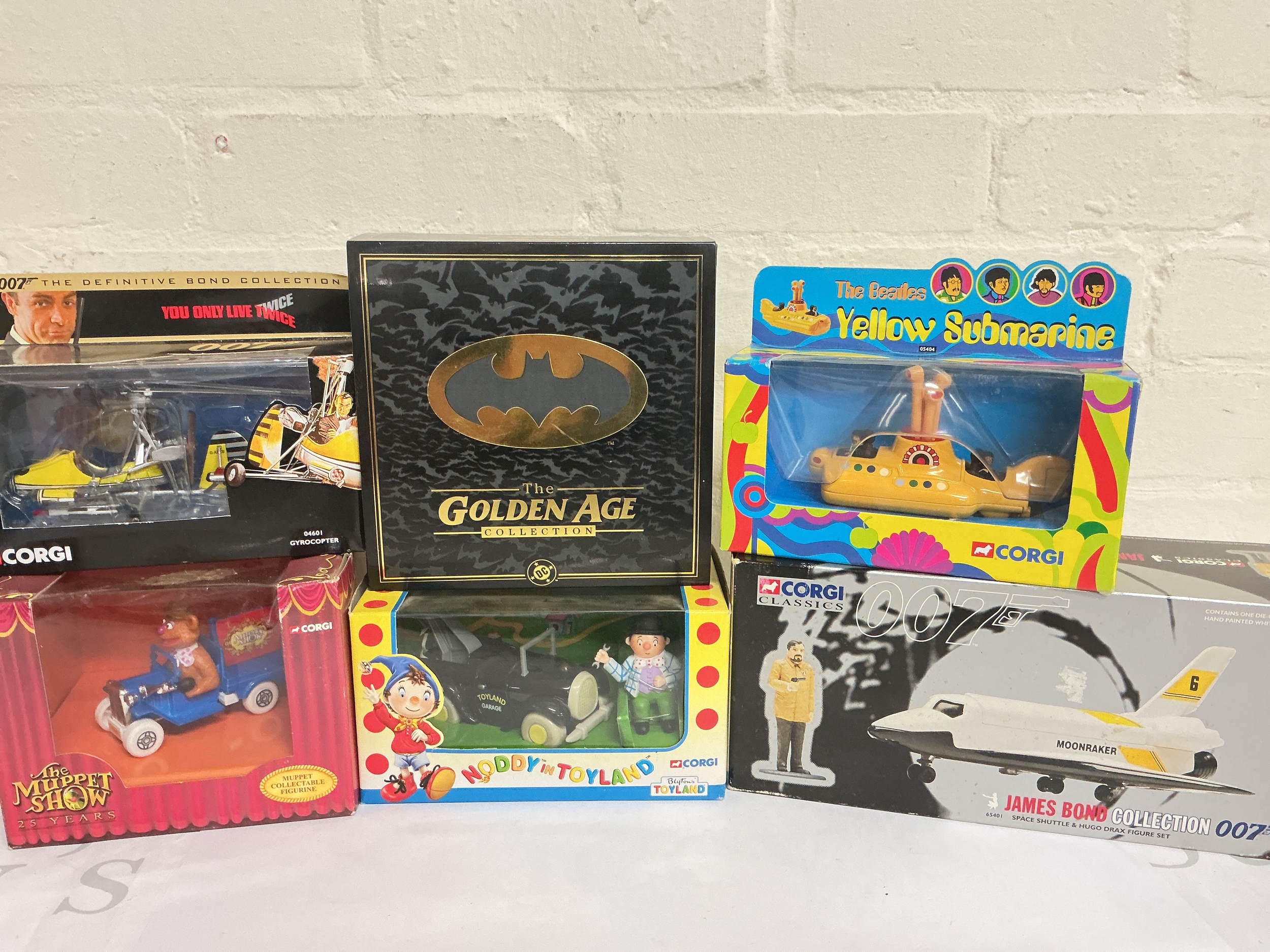 A Small Collection Of Boxed Corgi Diecast Including James Bond, Batman, The Beatles, The Muppet Show, And Noddy. No Reserve.