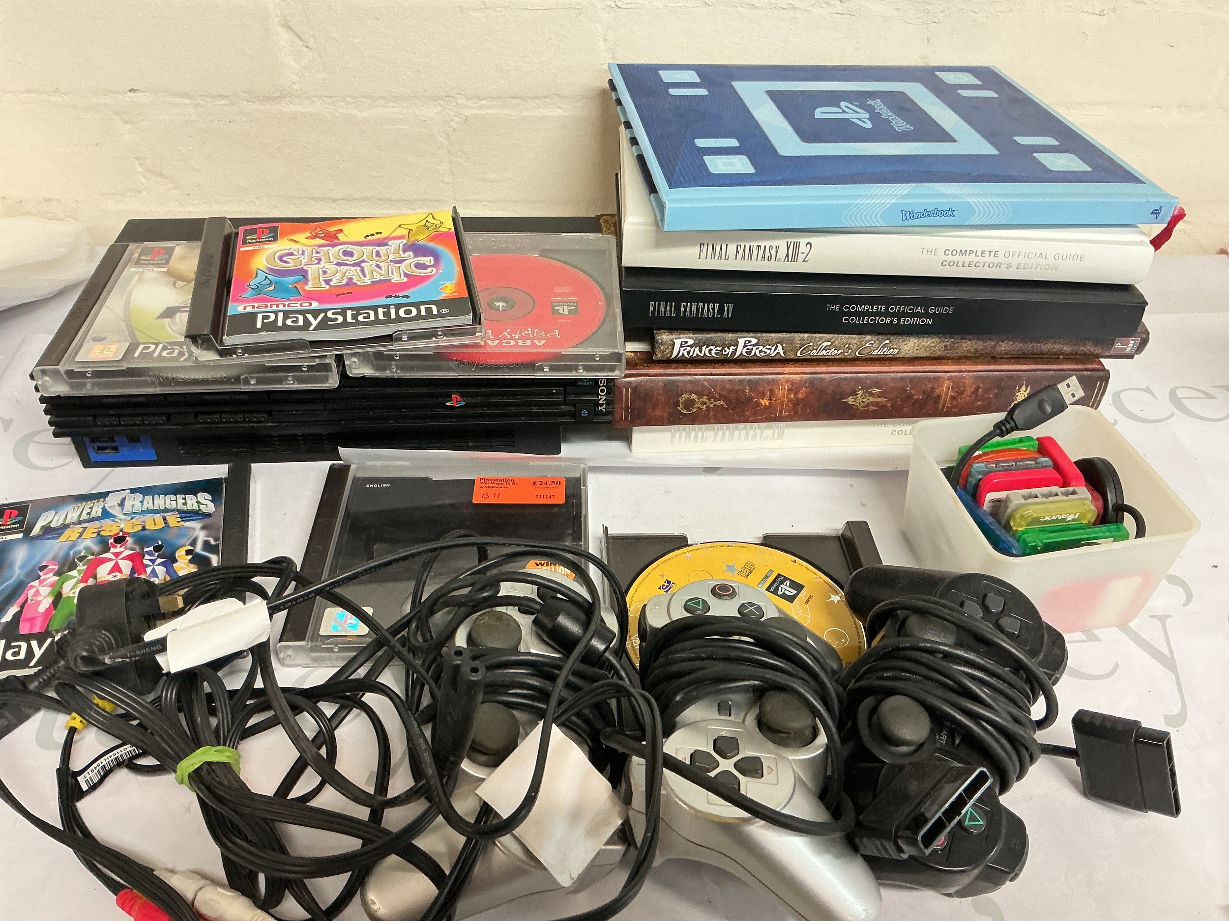 A Collection Of Various Computer Games For PlayStation,X-Box Including 3 Ps2 Consoles And Controllers. (5).