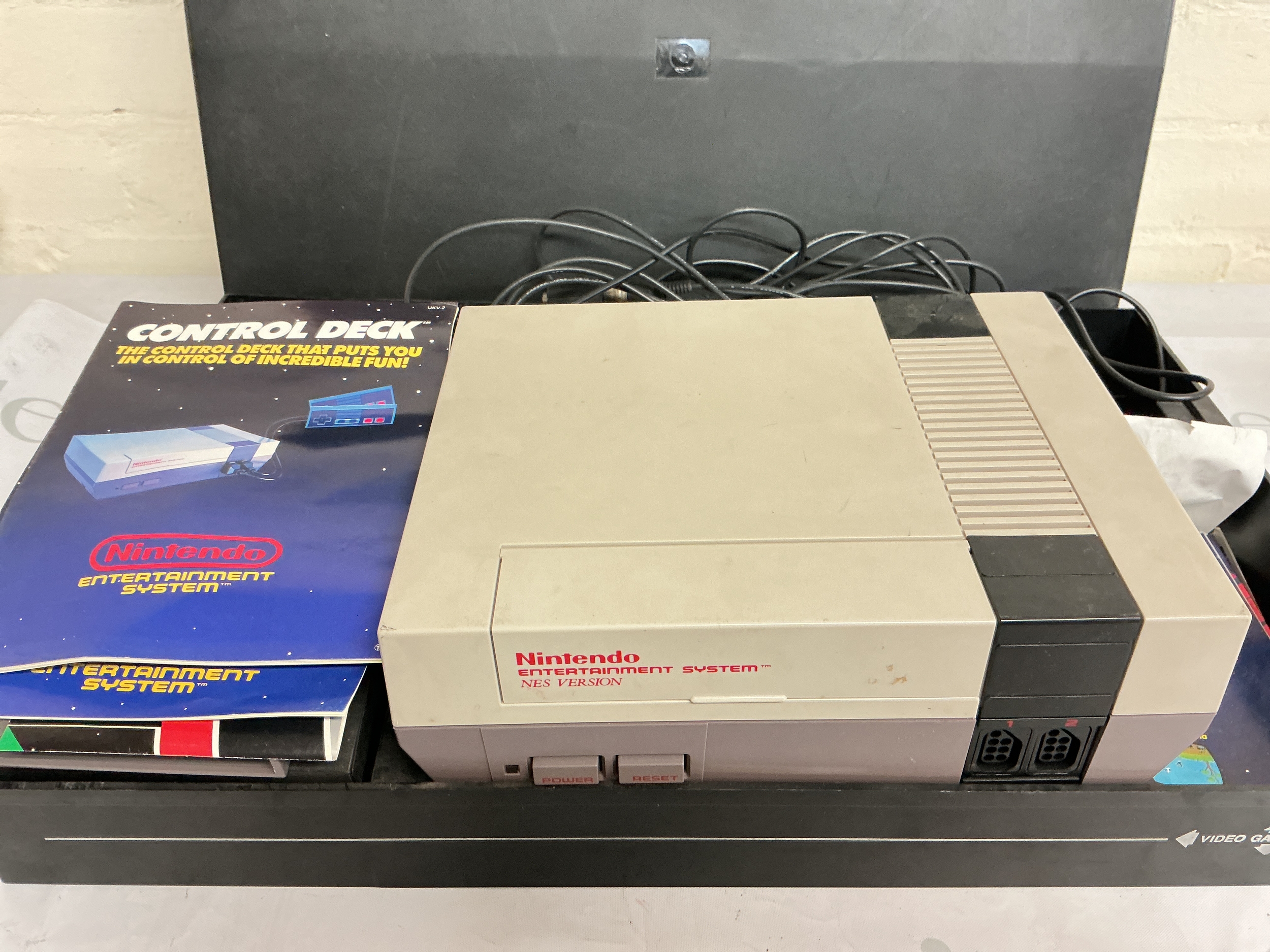 A Nintendo Entertainment System In Case With Games And Accessories. No Reserve.