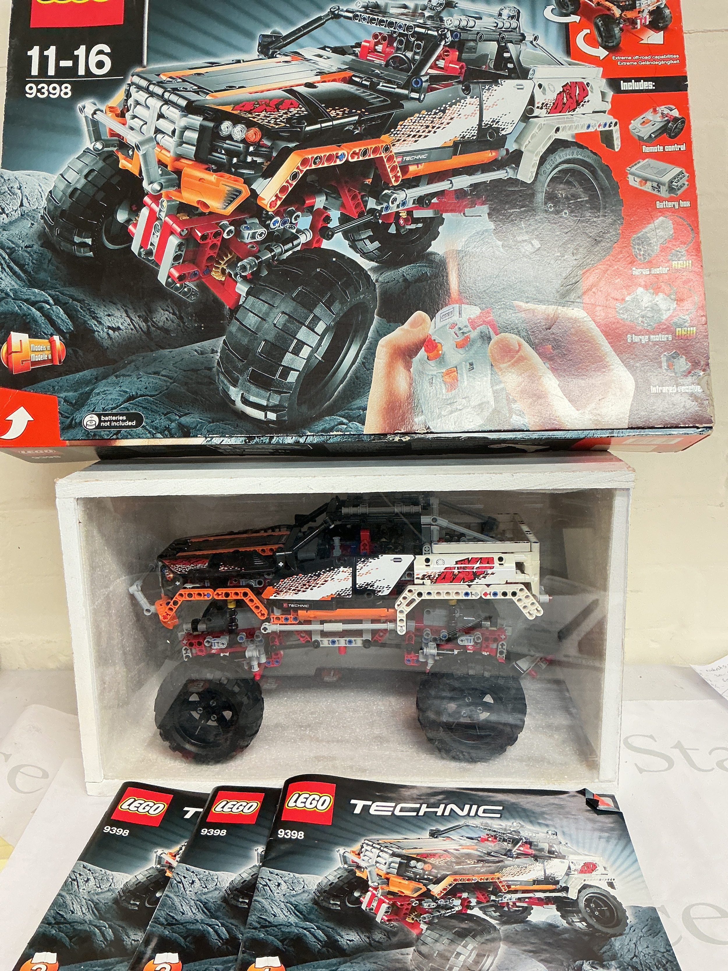 A Boxed Lego Technic 4X4 Crawler In Display Case With Box And Manuals. (2) No Reserve.