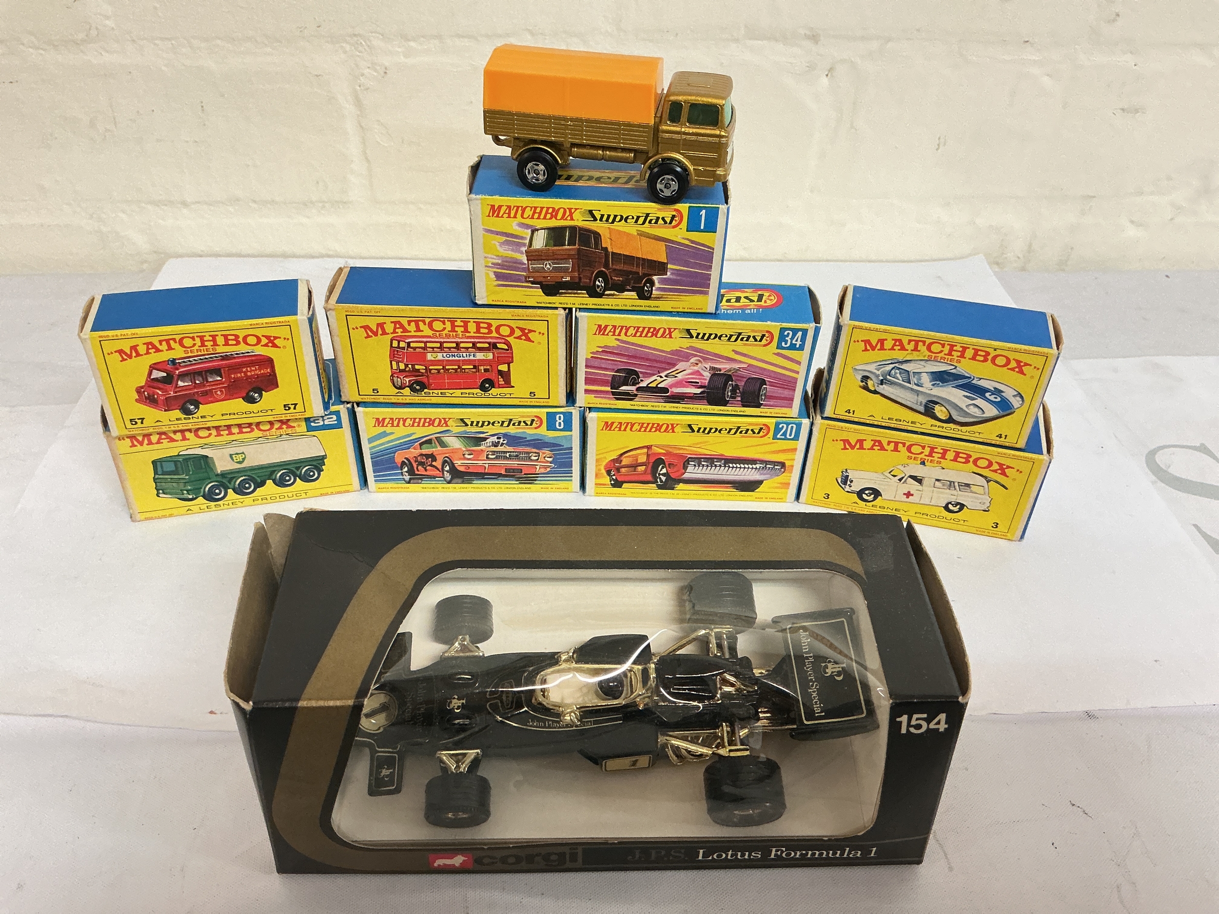 9 Boxed Matchbox Diecast And A Corgi Lotus F1 Car.