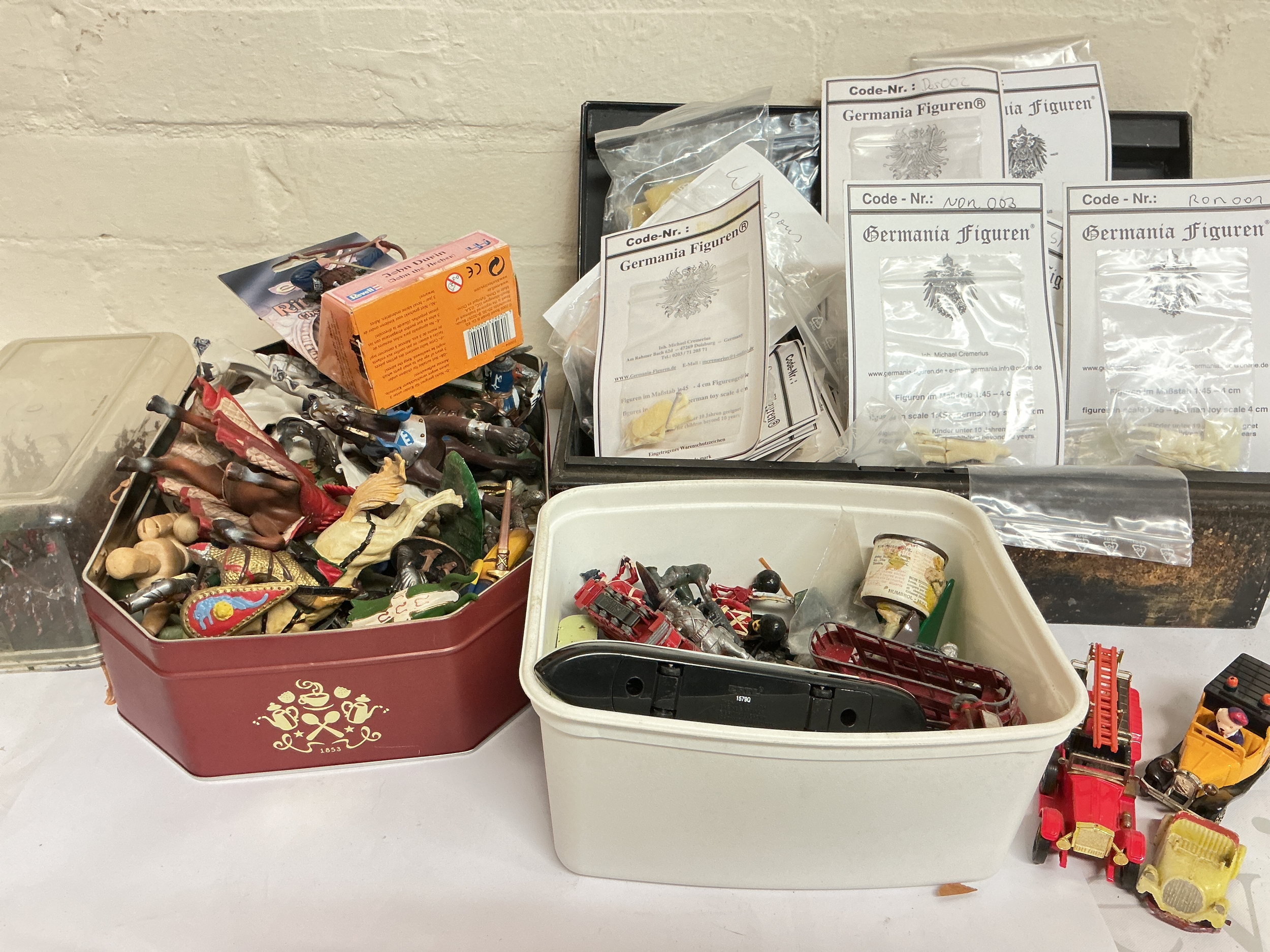 A Box Containing Germanic Figure Kits, plastic And Led Toy Soldiers, Diecast Vehicles Etc. No Reserve.