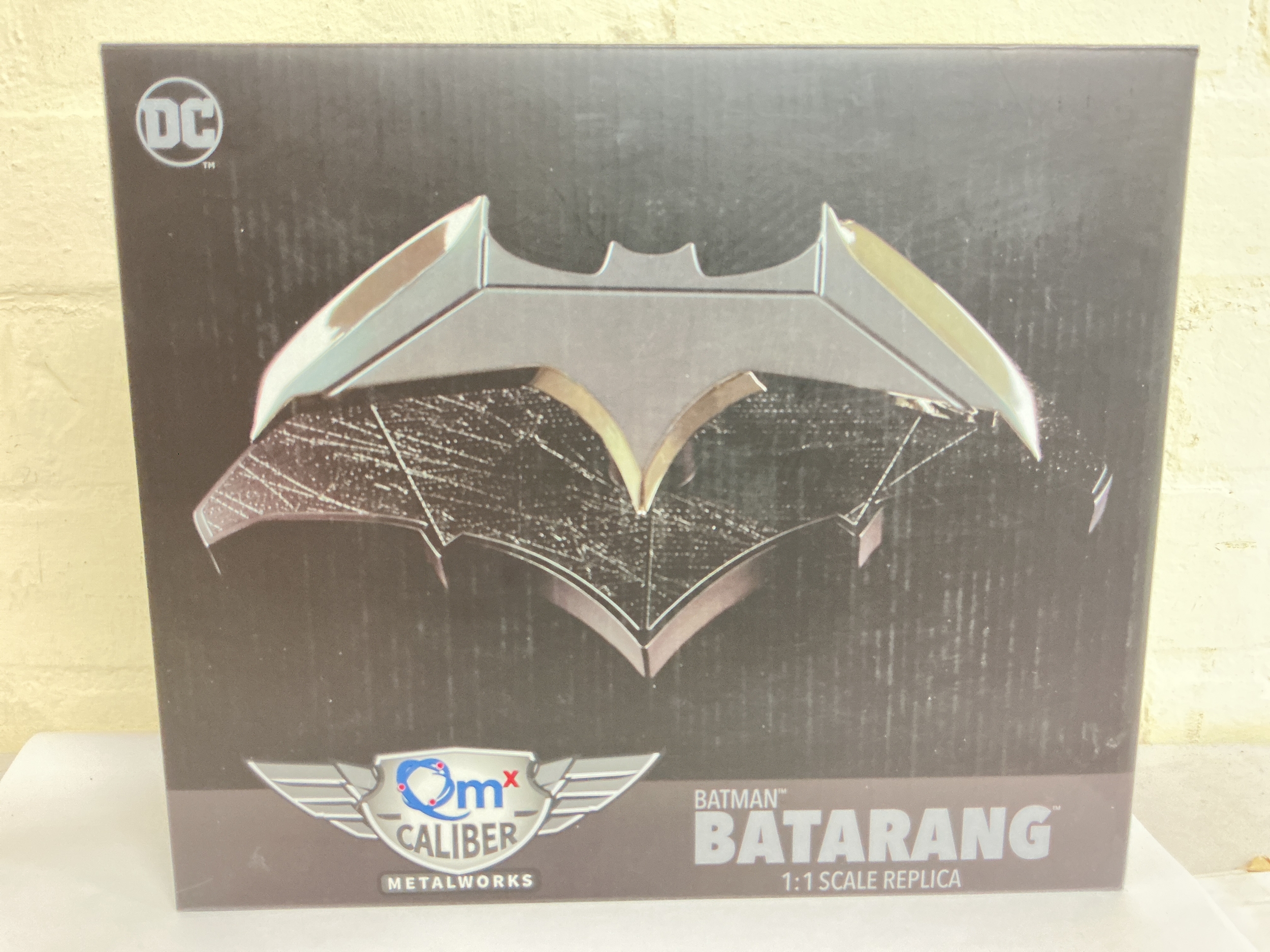A Boxed Quantum Mechanix Batman Batarang 1/1 Scale Replica.
