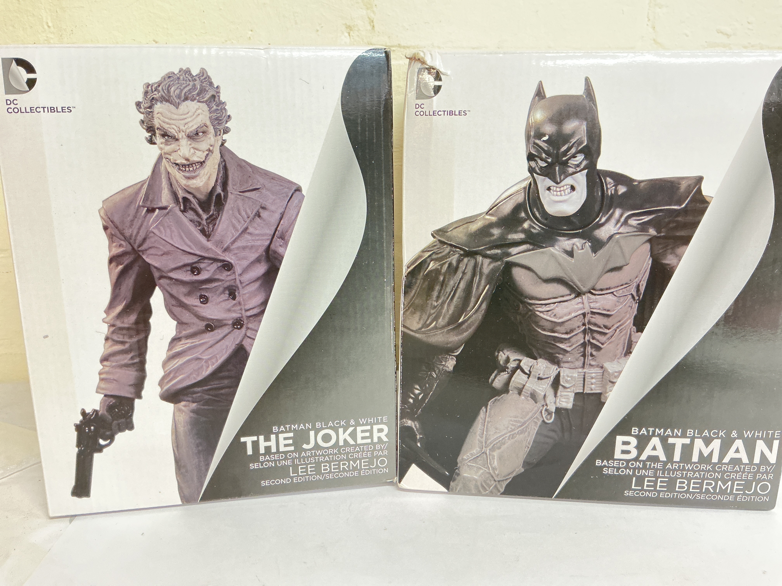 2 X Boxed DC Collectibles Batman And Joker Statues. (2).
