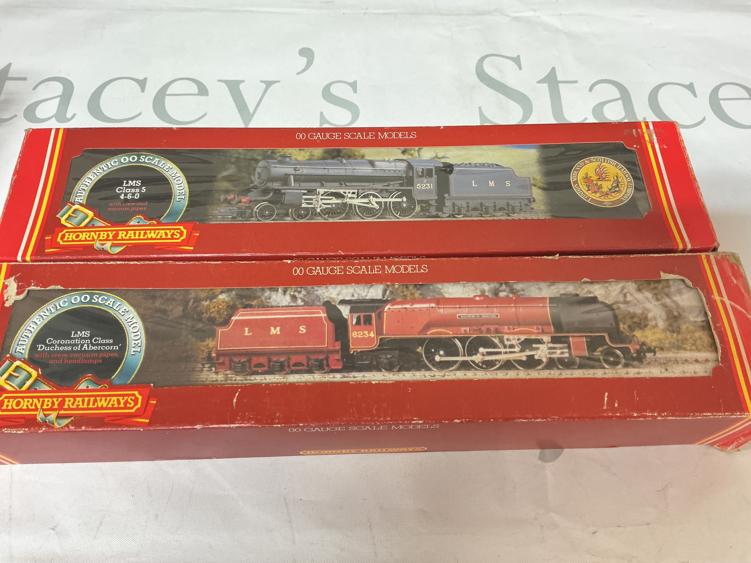 2 X Boxed Hornby 00 Gauge Locomotives.ALMS Coronation Class Duchess Of Abercorn #R.305 And A LMS Class 5 Loco Black Livery #R.320. No Reserve.