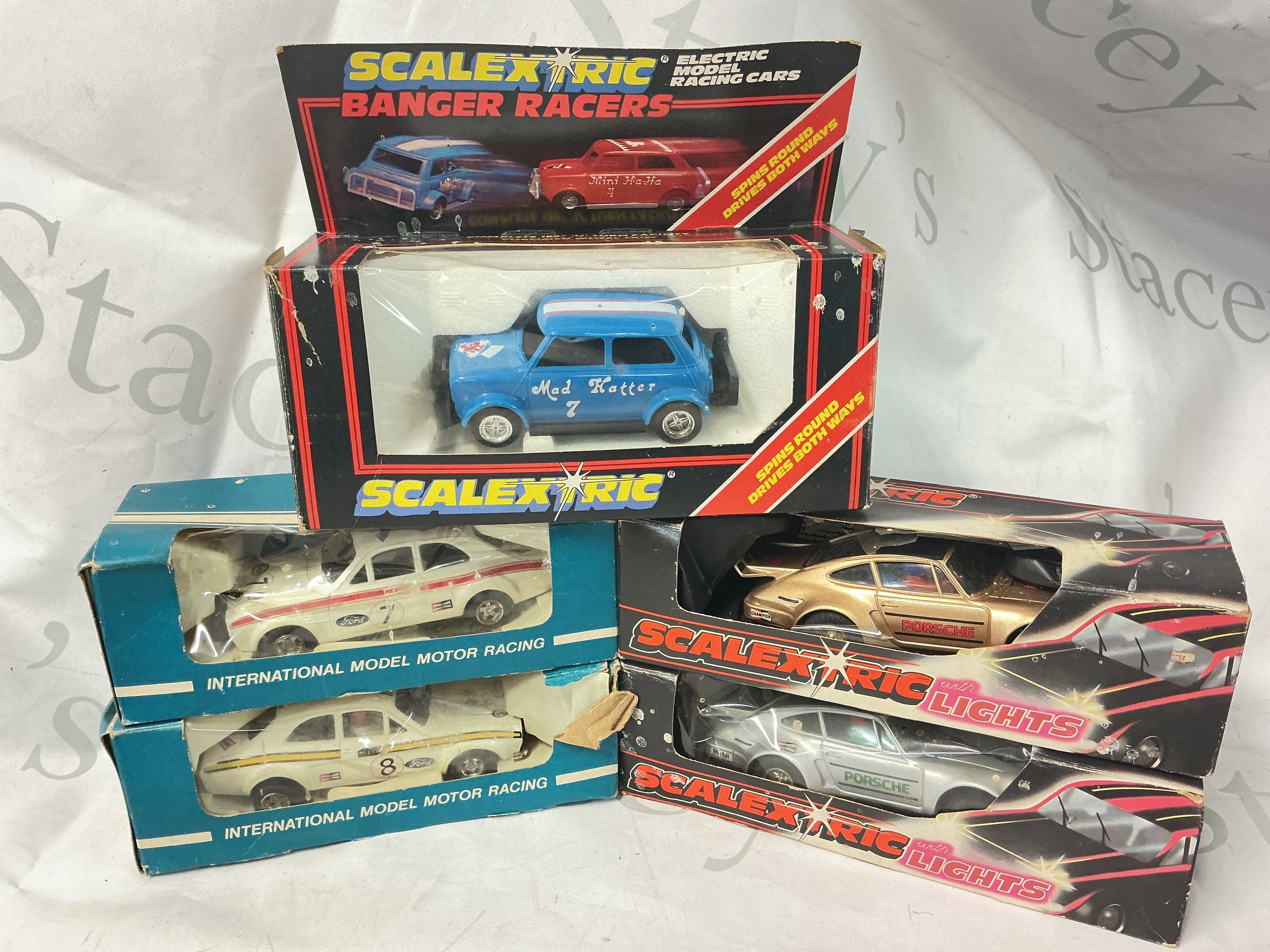 5 Boxed Scalextric Cars Including 2 X Porsche #C.288 And C.289, 2 X Ford Escorts #C.052 And A Mad Hatter Banger Racer.