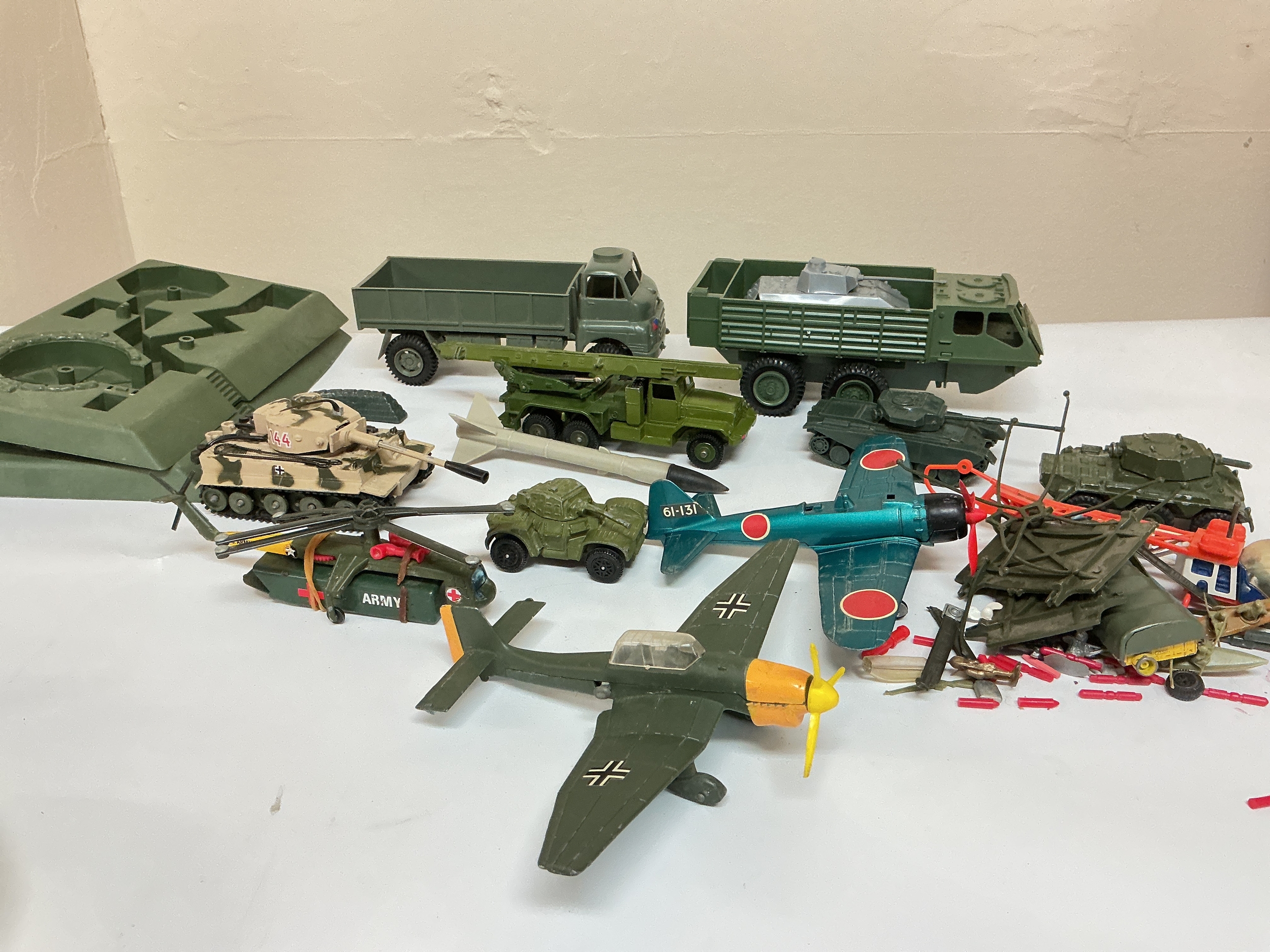 2 Boxes Containing Military Plastic And Dicast Vehicles, Including Airfix And Dinky. No Reserve.