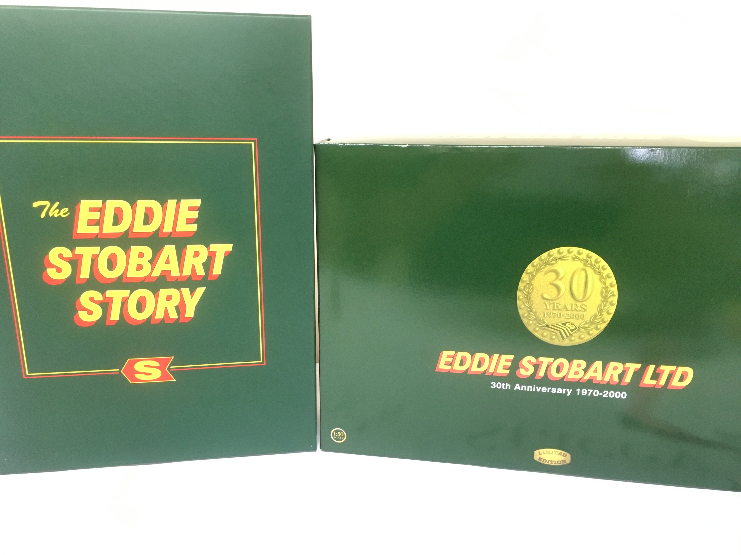 A Boxed Corgi The Eddie Stobart Story Set And A 30Th Anniversary 1970-2000 Set. (2).