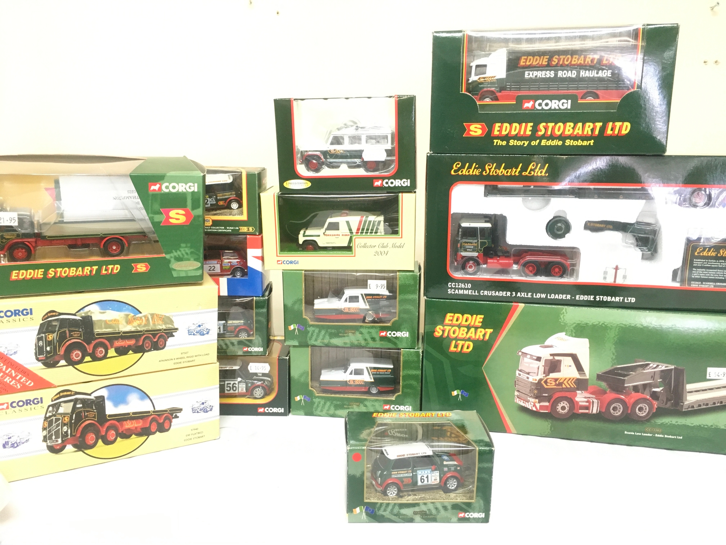 A Collection Of Corgi Eddie Stobart Diecast Including A 2001 MSA British Rally Championship Mini With Red Mirrors.