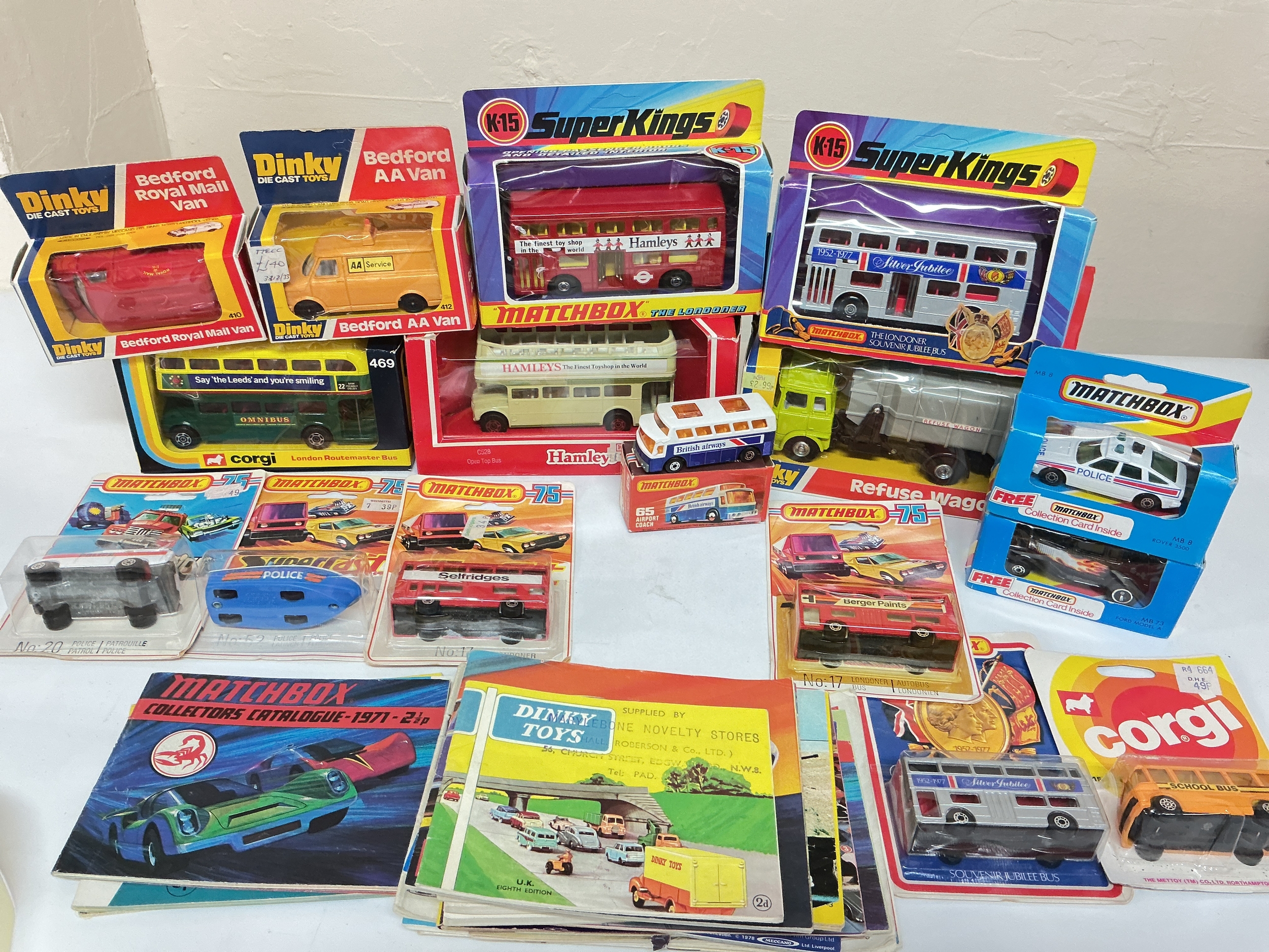 A Collection Of Boxed And Carded Diecast, including Dinky, matchbox And A Collection Of Catalogs. No Reserve.