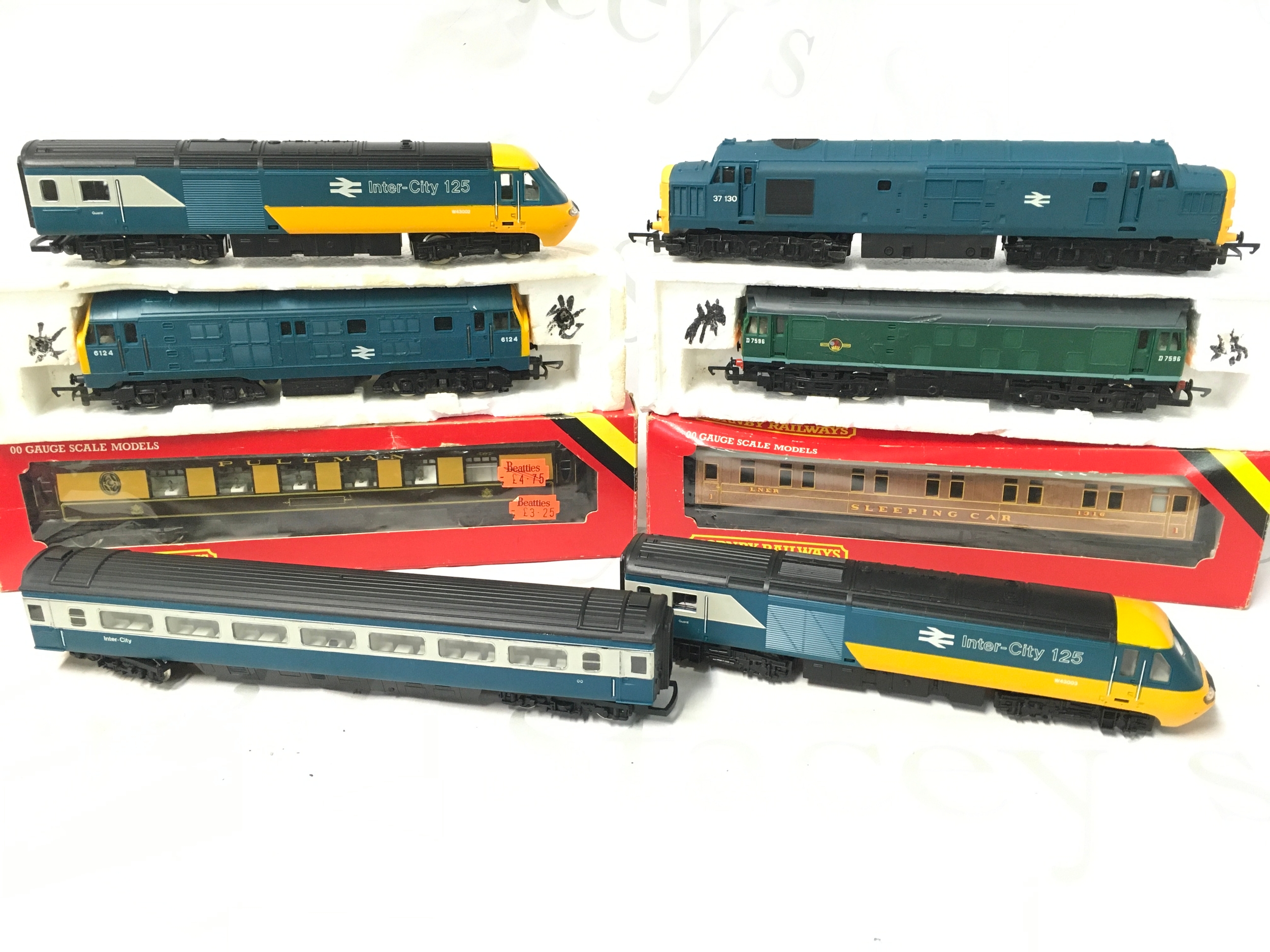 A Collection of 00 Gauge Locomotives, Coaches, Wagons And Track.