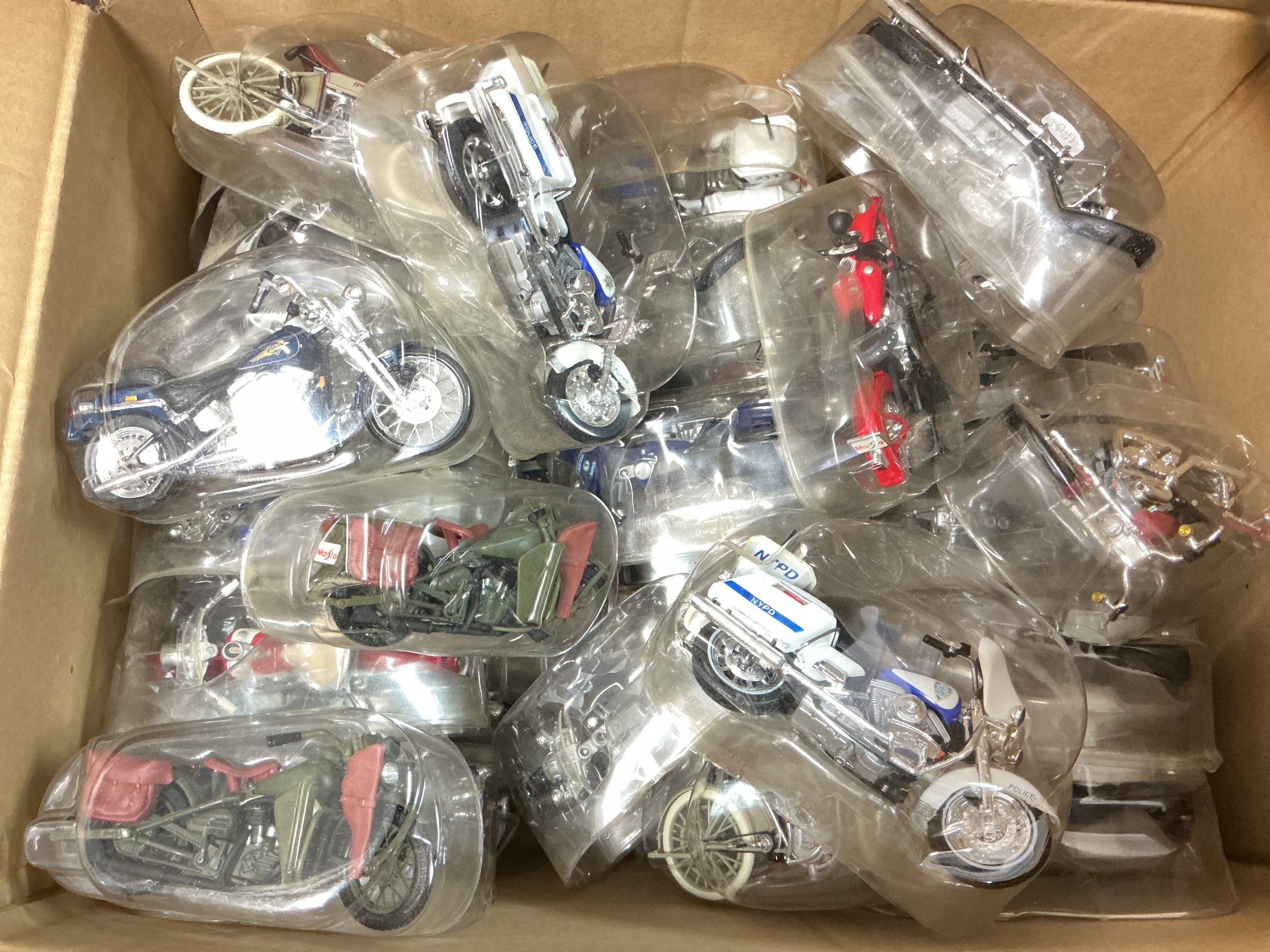 A Box Containing Maisto Motor Bikes. Approximately 45 Bikes. No Reserve.