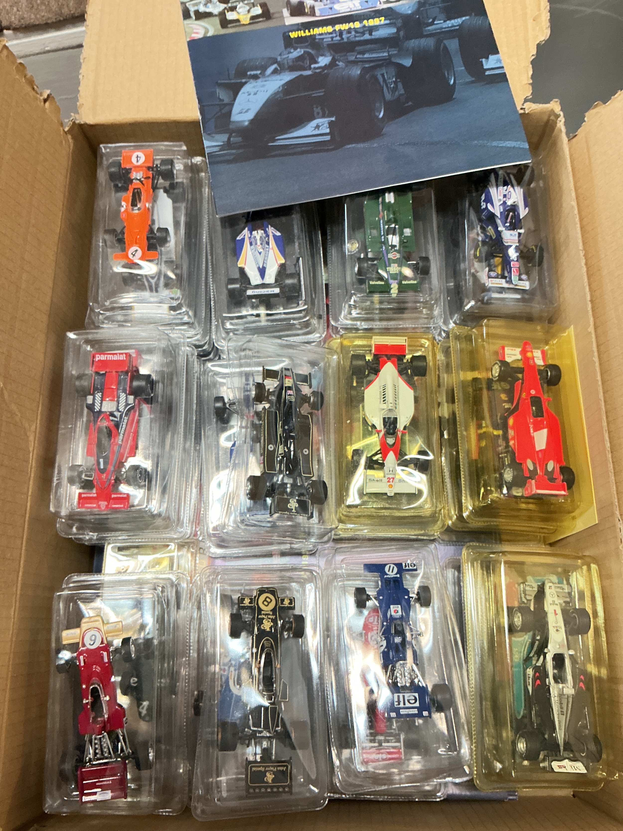 A Box Containing Grand Prix Legends Of Formula 1 With Magazines. No Reserve.