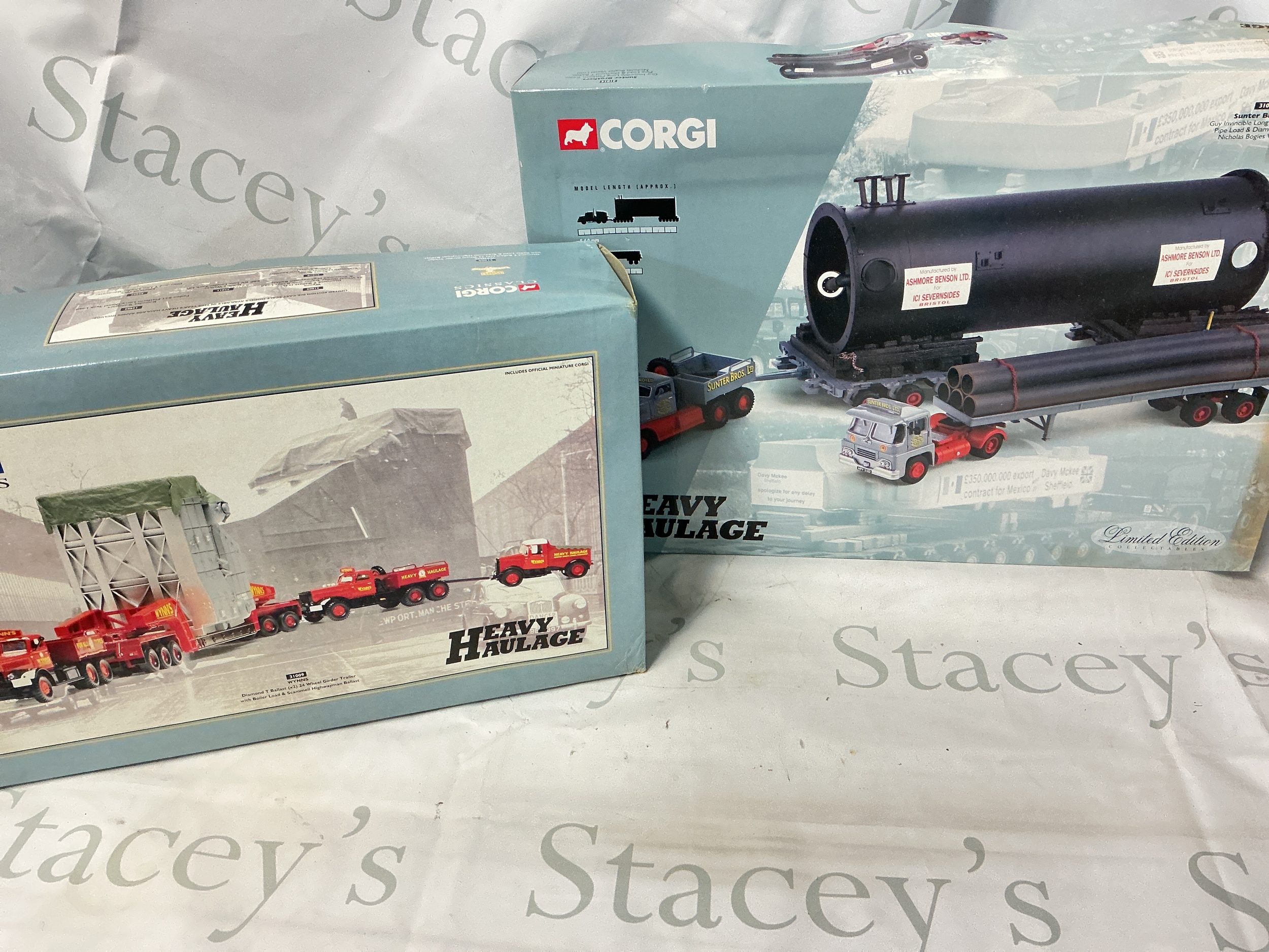 A Boxed Corgi Heavy Haulage Dimond T Ballast #31009 And A Guy Invincible Platform Trailer #31014. No Reserve.