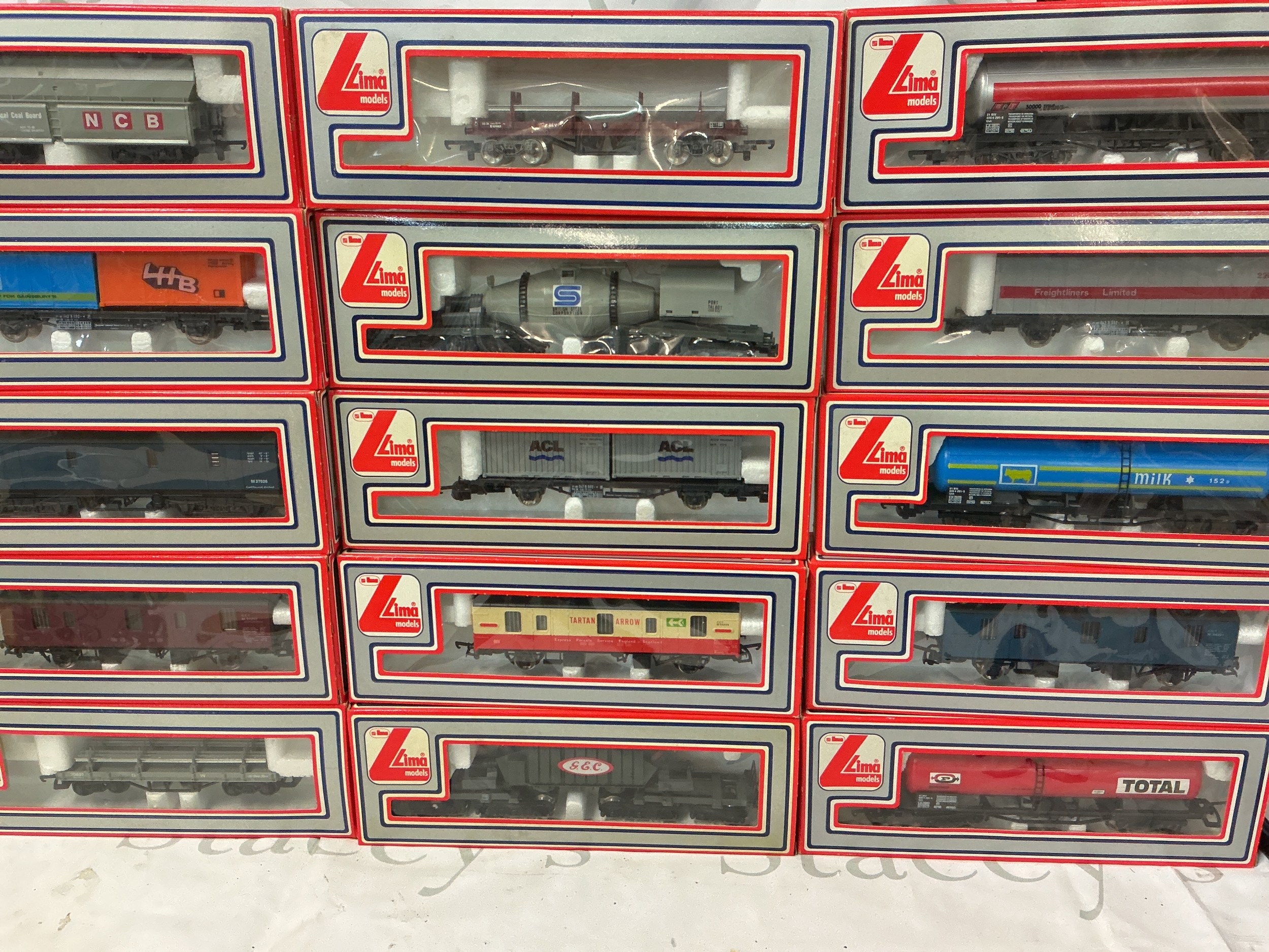 A Collection Of Boxed Lima 00 Gauge Wagons And Coaches. No Reserve.