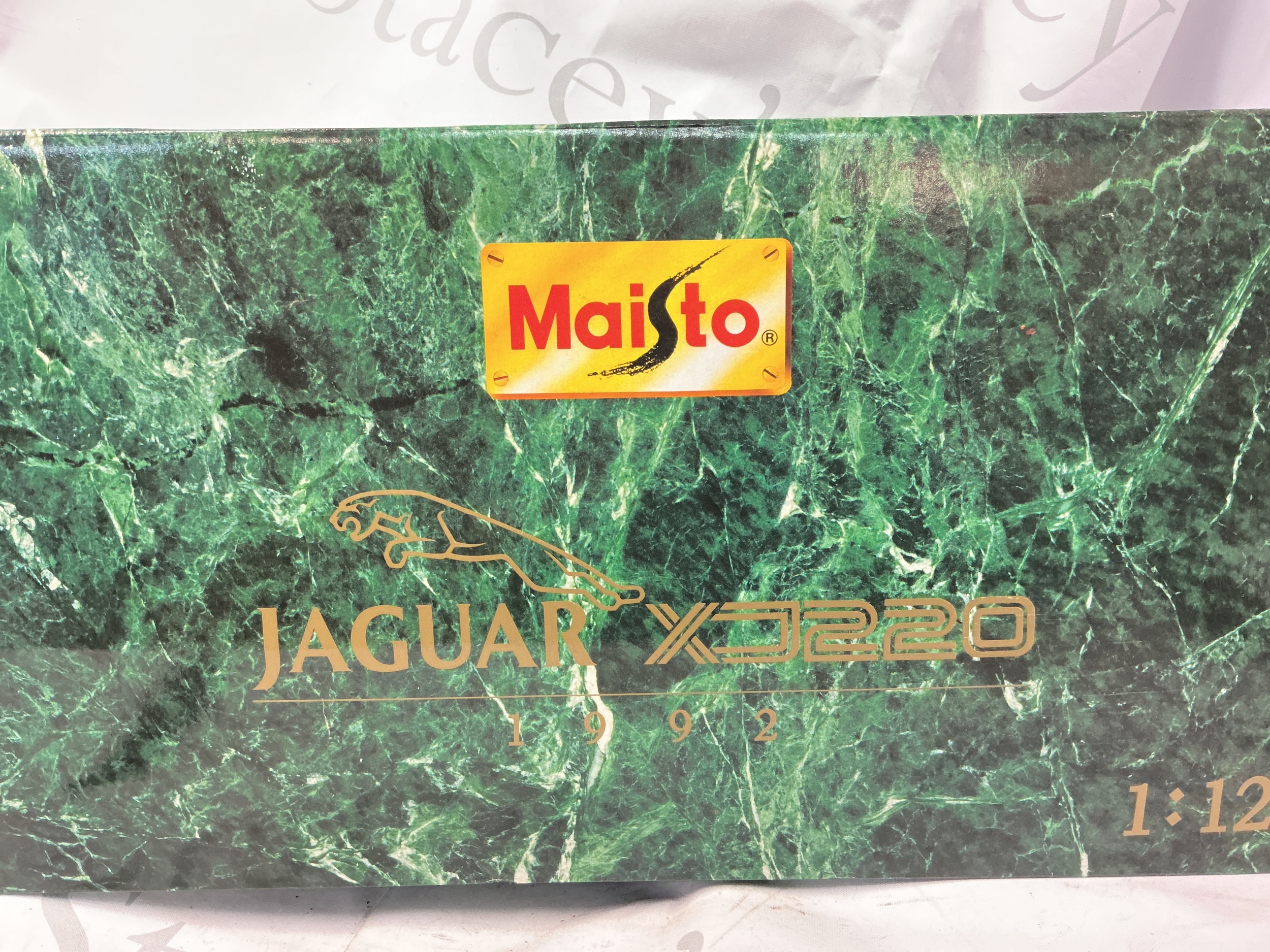 A Boxed Maisto 1/12 scale Jaguar XJ220