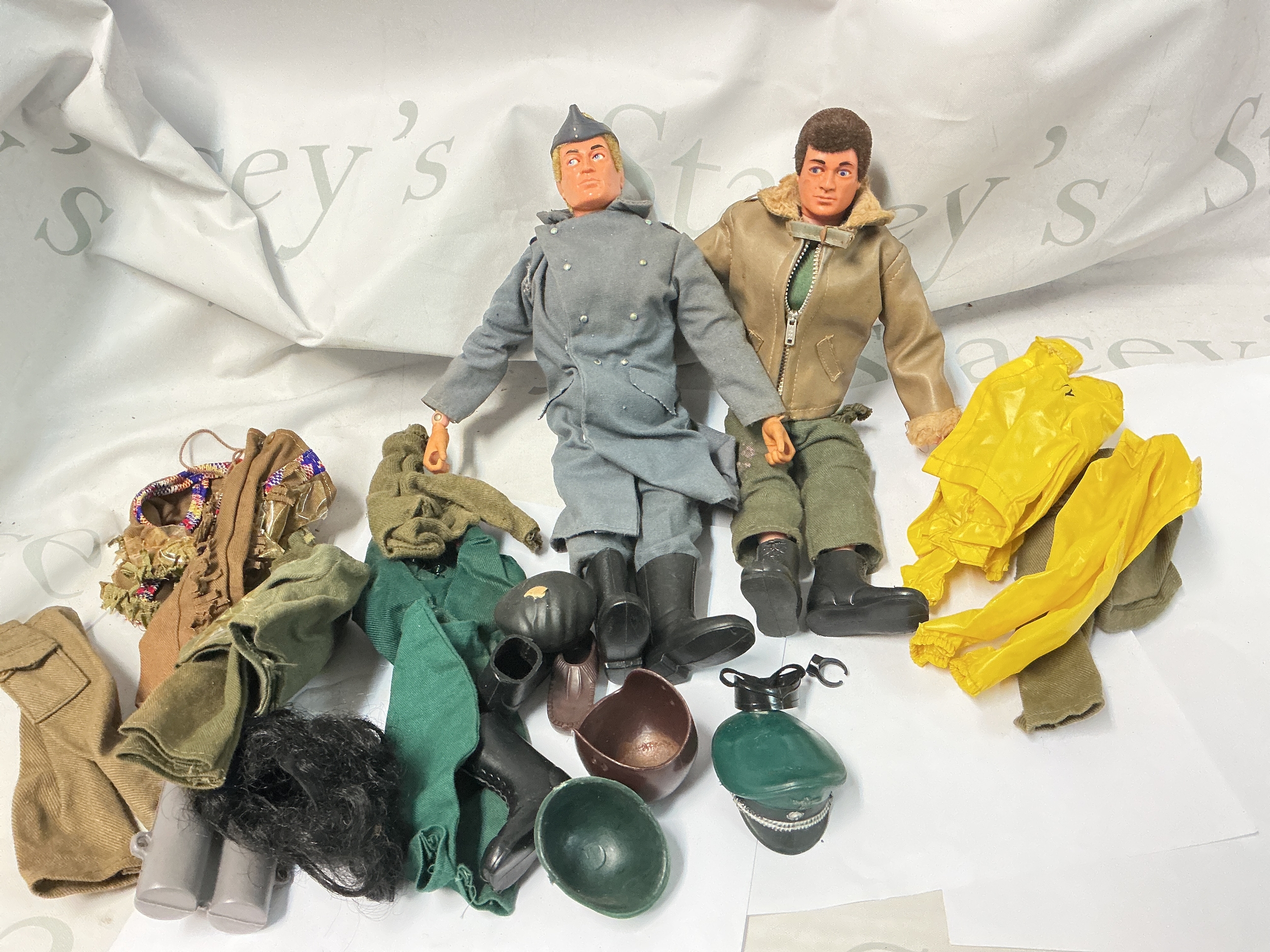 2 Vintage Action Men, A Small Amount Of Cloths And 2 Chrilea Vehicles. No Reserve.